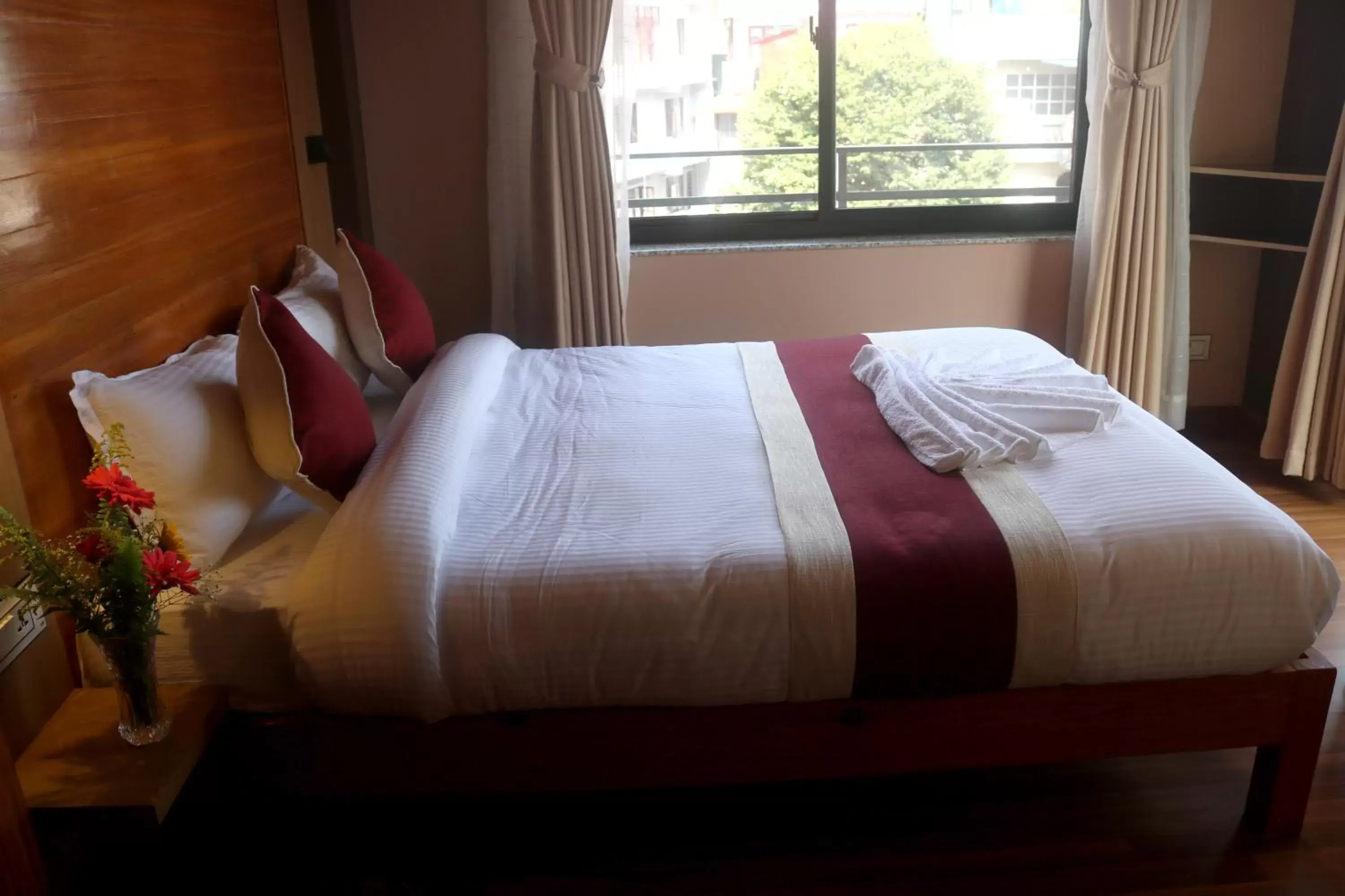 Bed in Hotel Family Ties Pvt. Ltd. Bed in Hotel Family Ties Pvt. Ltd.