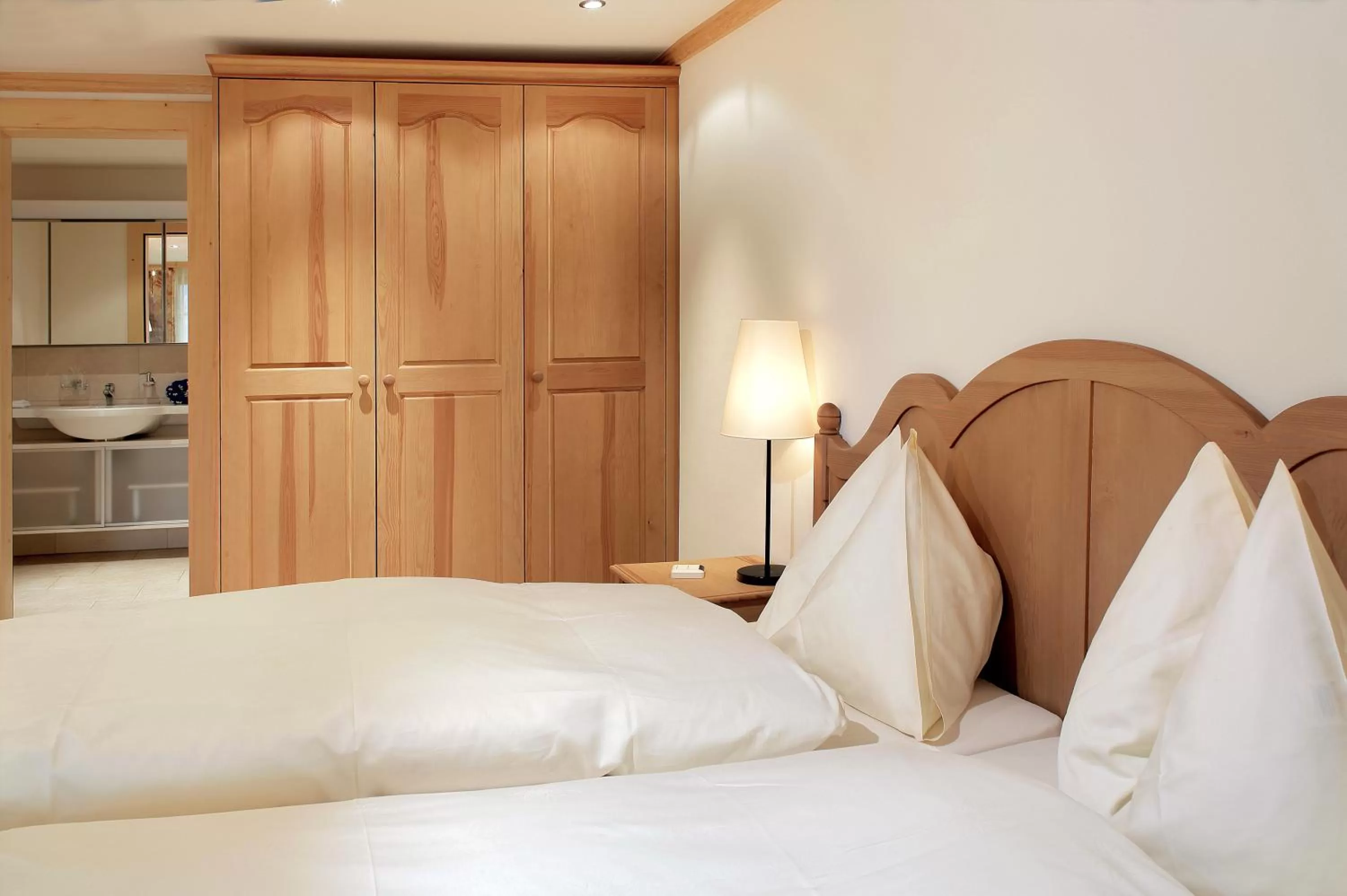 Photo of the whole room, Bed in Hotel Bellerive Gstaad