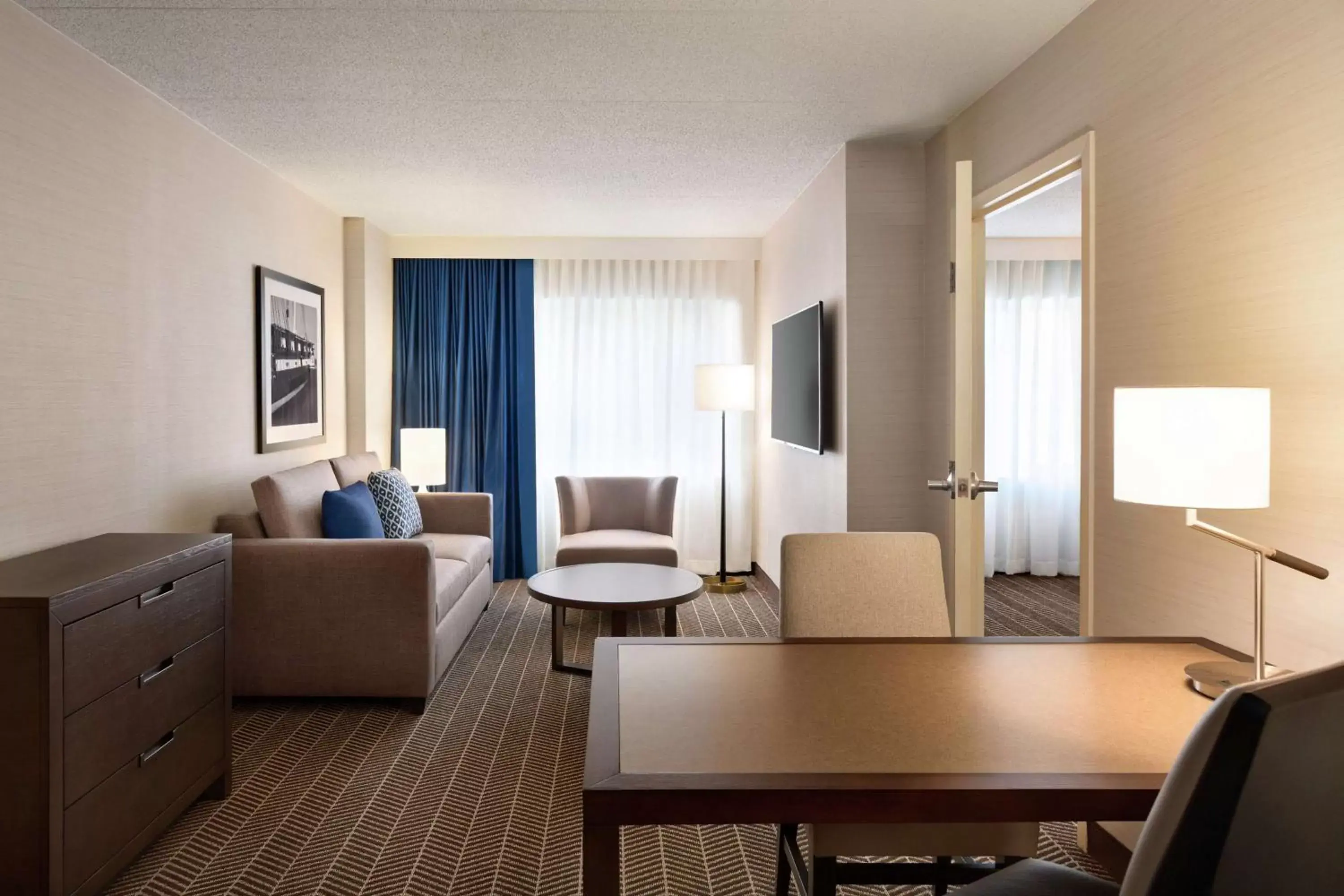 Living room, Seating Area in Embassy Suites Boston at Logan Airport