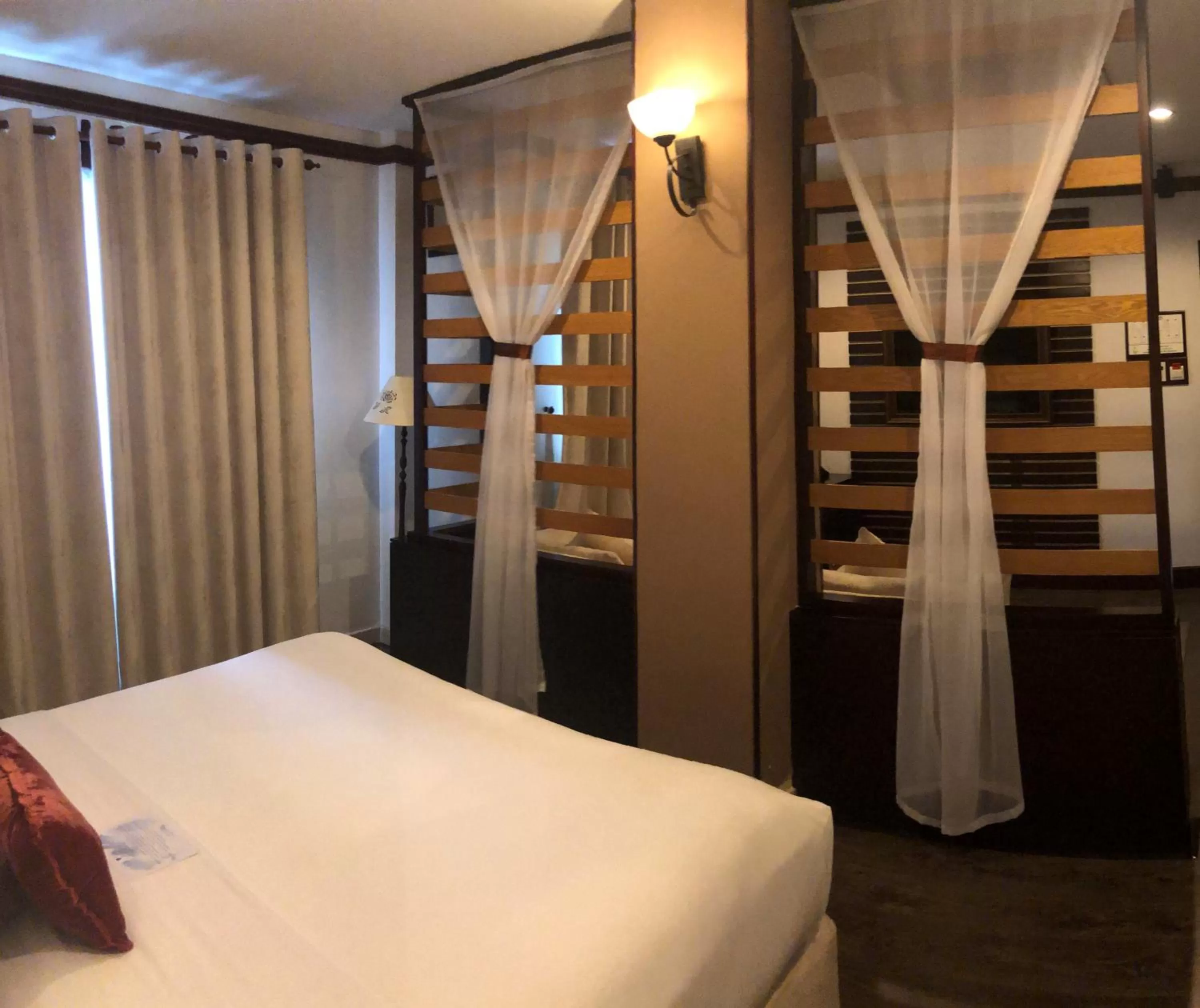 Photo of the whole room, Bed in Prostyle Hotel Ho Chi Minh プロスタイルホテルホーチミン