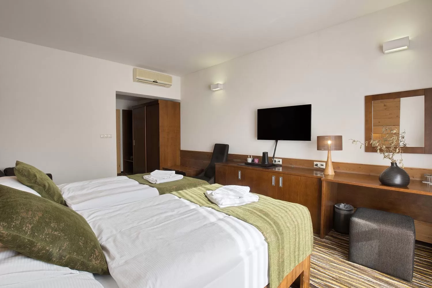 Bed in Equitana Hotel Resort