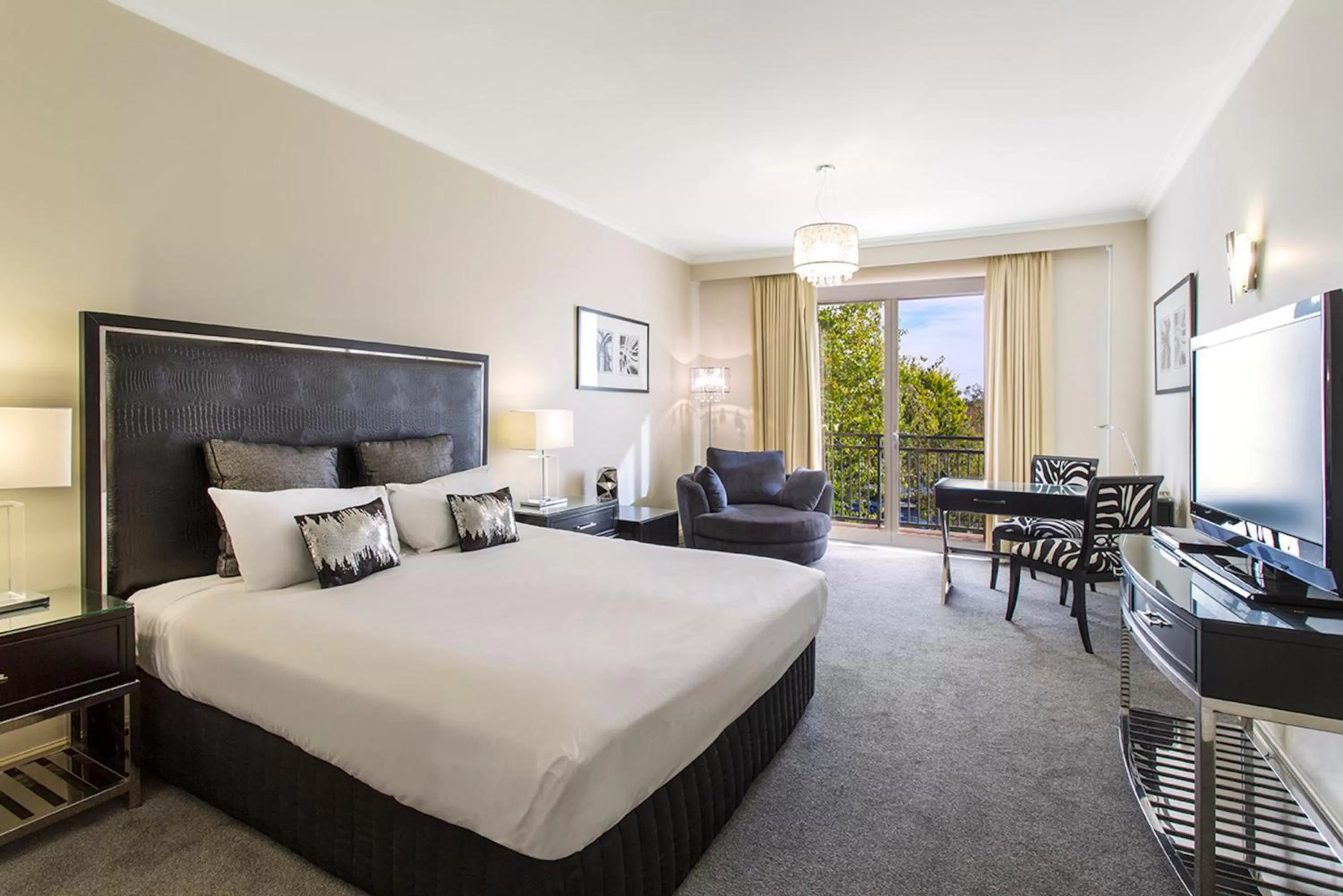 Bedroom, Bed in The Carrington Hotel