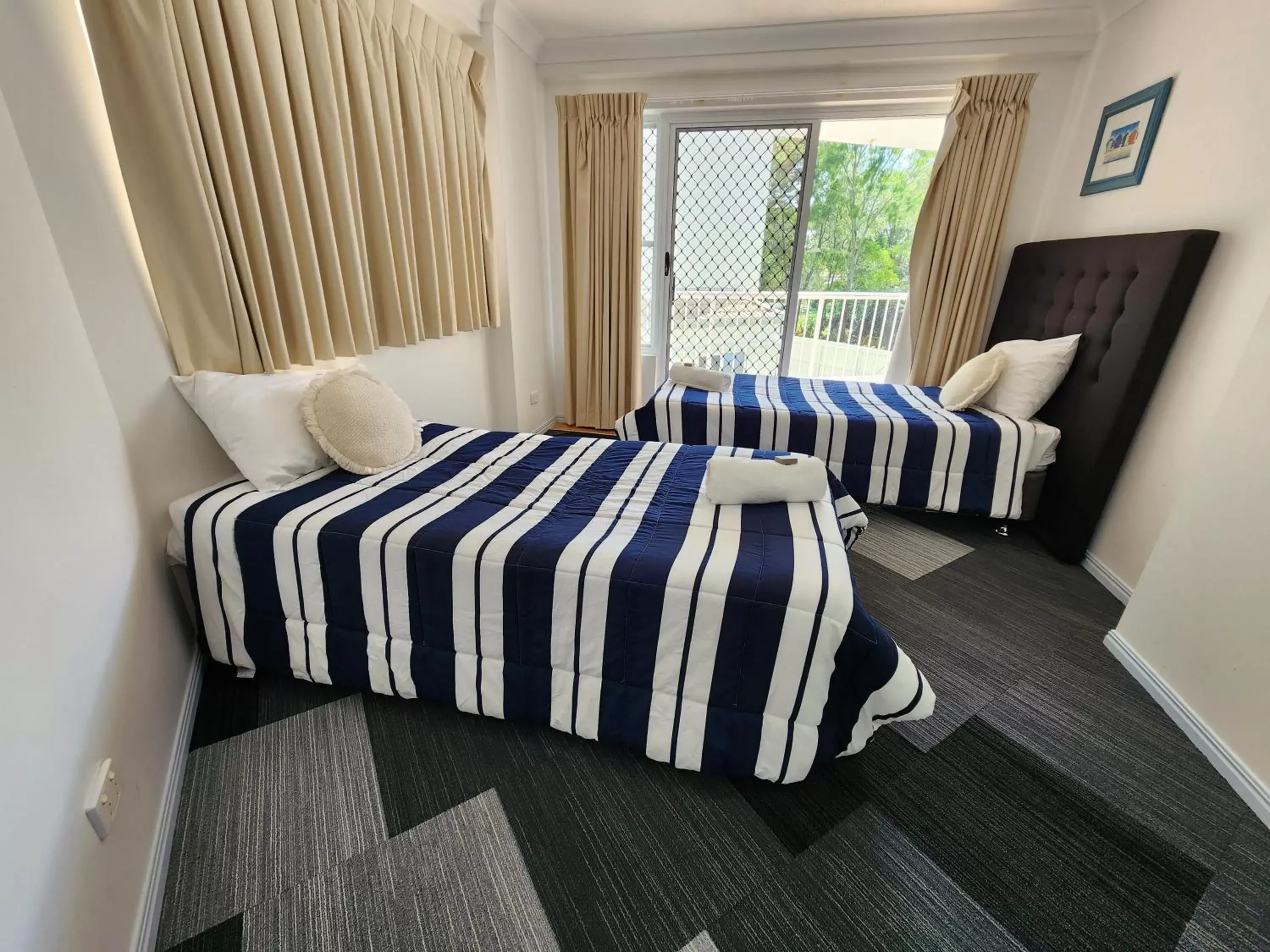 Bed in Fairways Golf & Beach Retreat Bribie Island