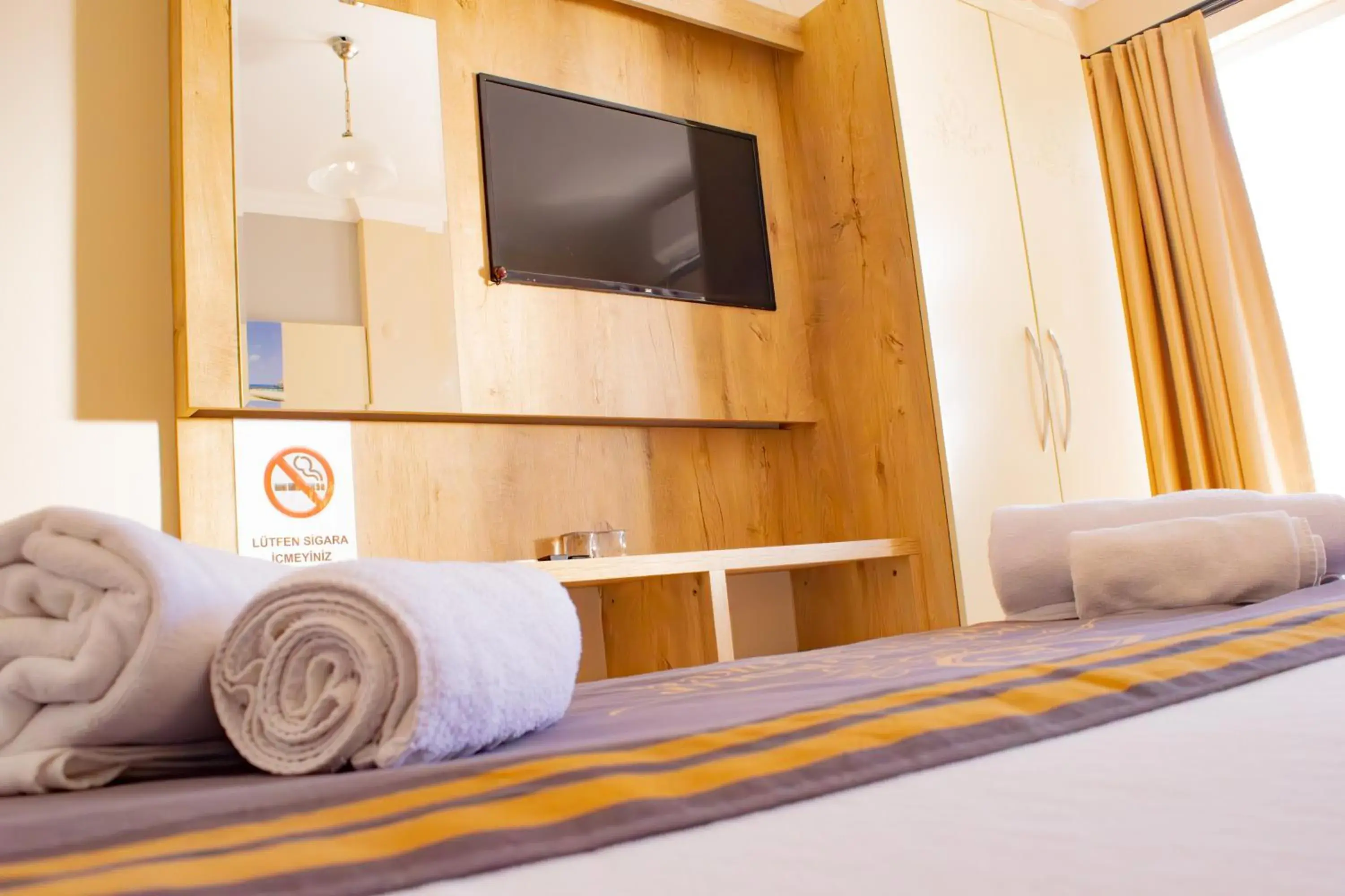 TV and multimedia, Bed in Akkan Beach Hotel