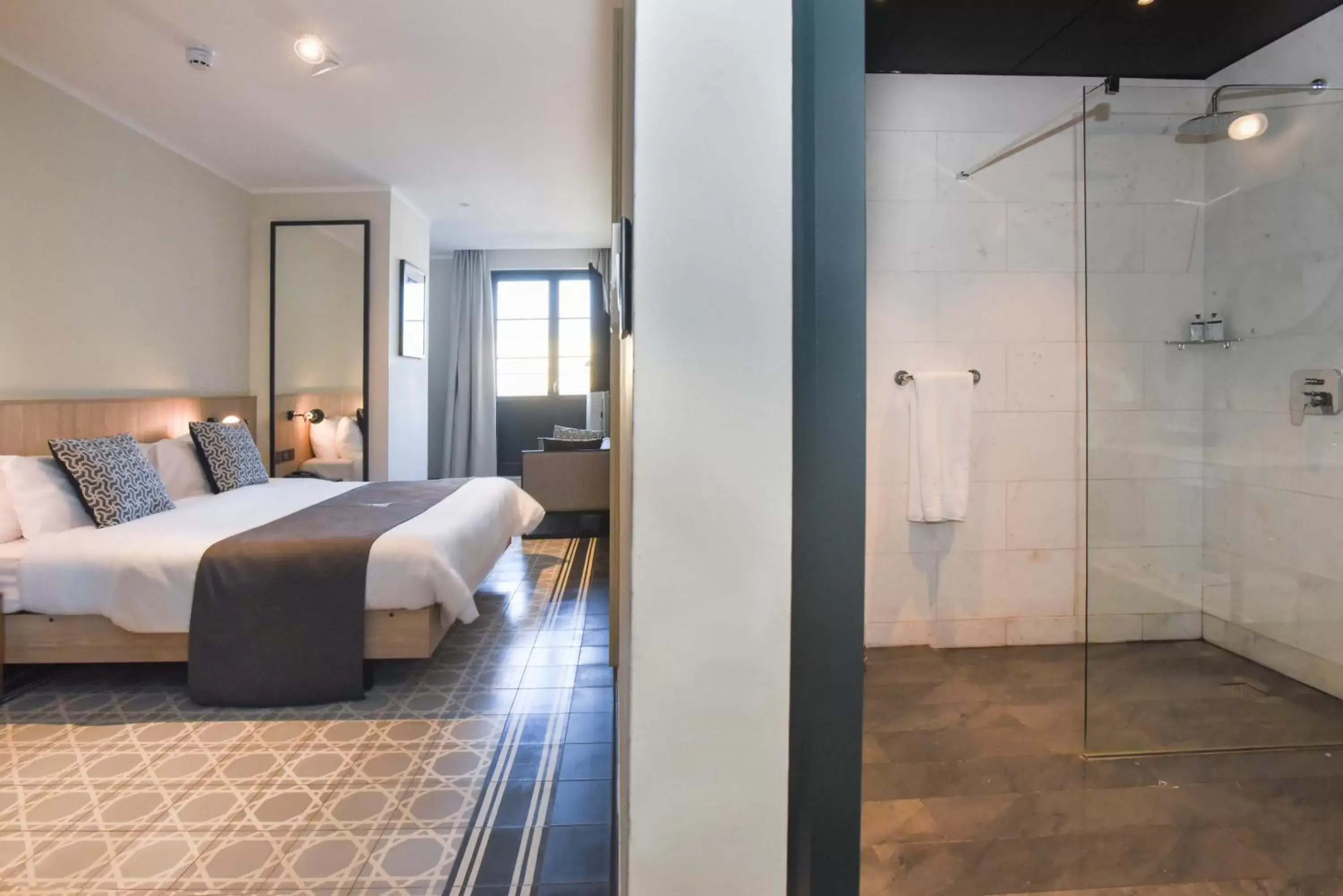 Bed in La Falconeria Hotel Bed in La Falconeria Hotel