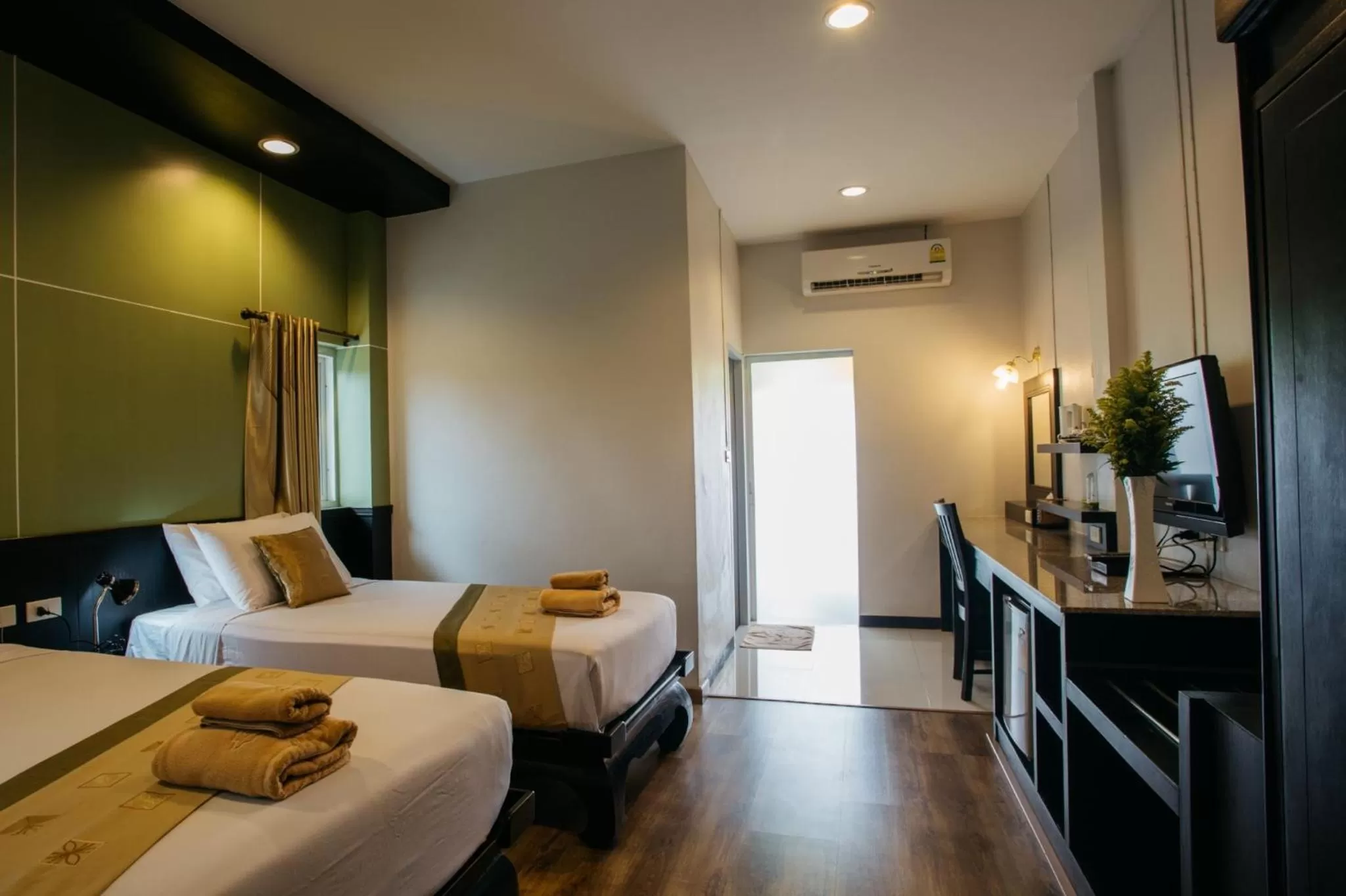 Photo of the whole room, Bed in Diamond Park Inn Chiangrai & Resort