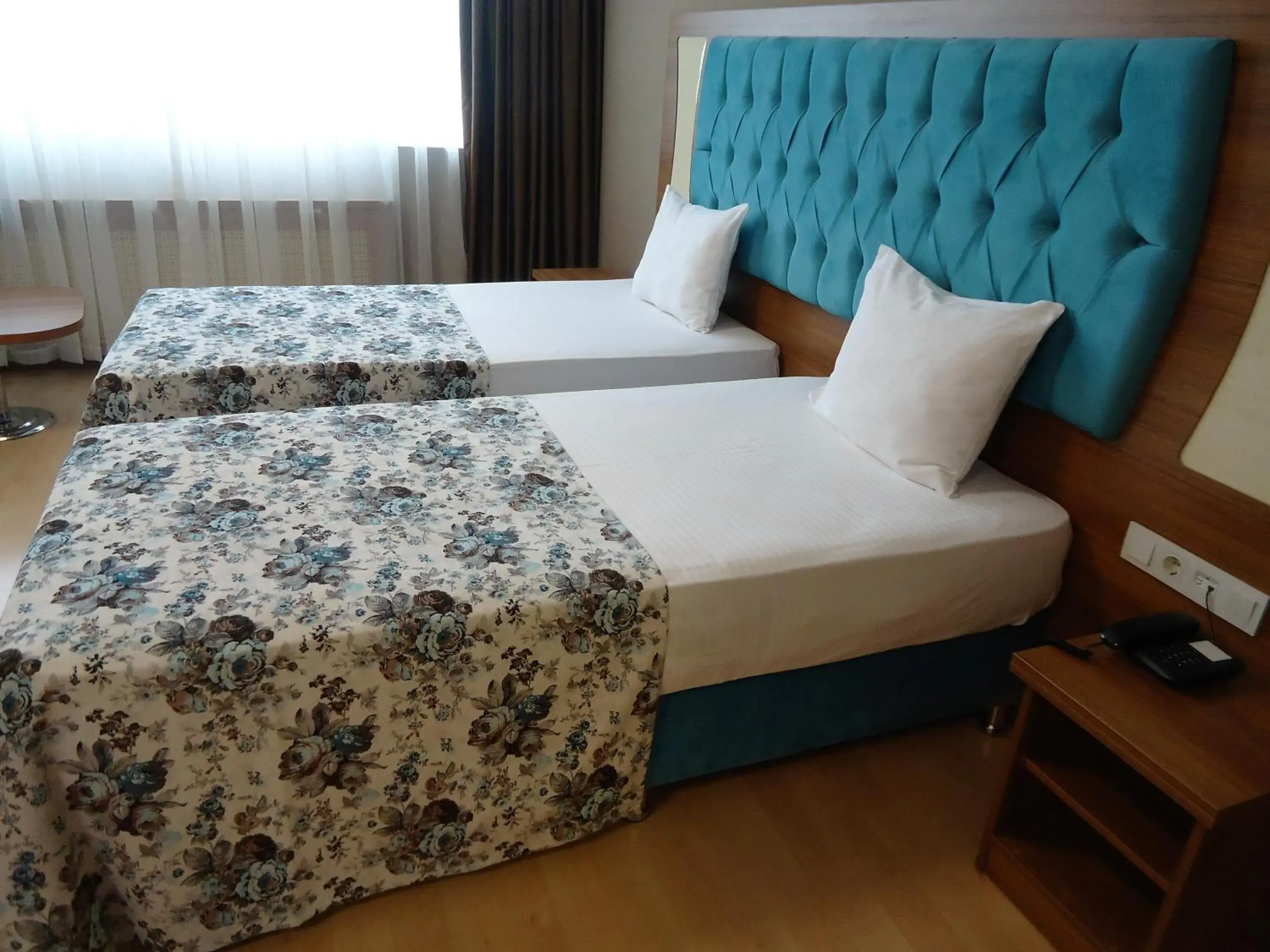 Bed in Golden Lounge Hotel