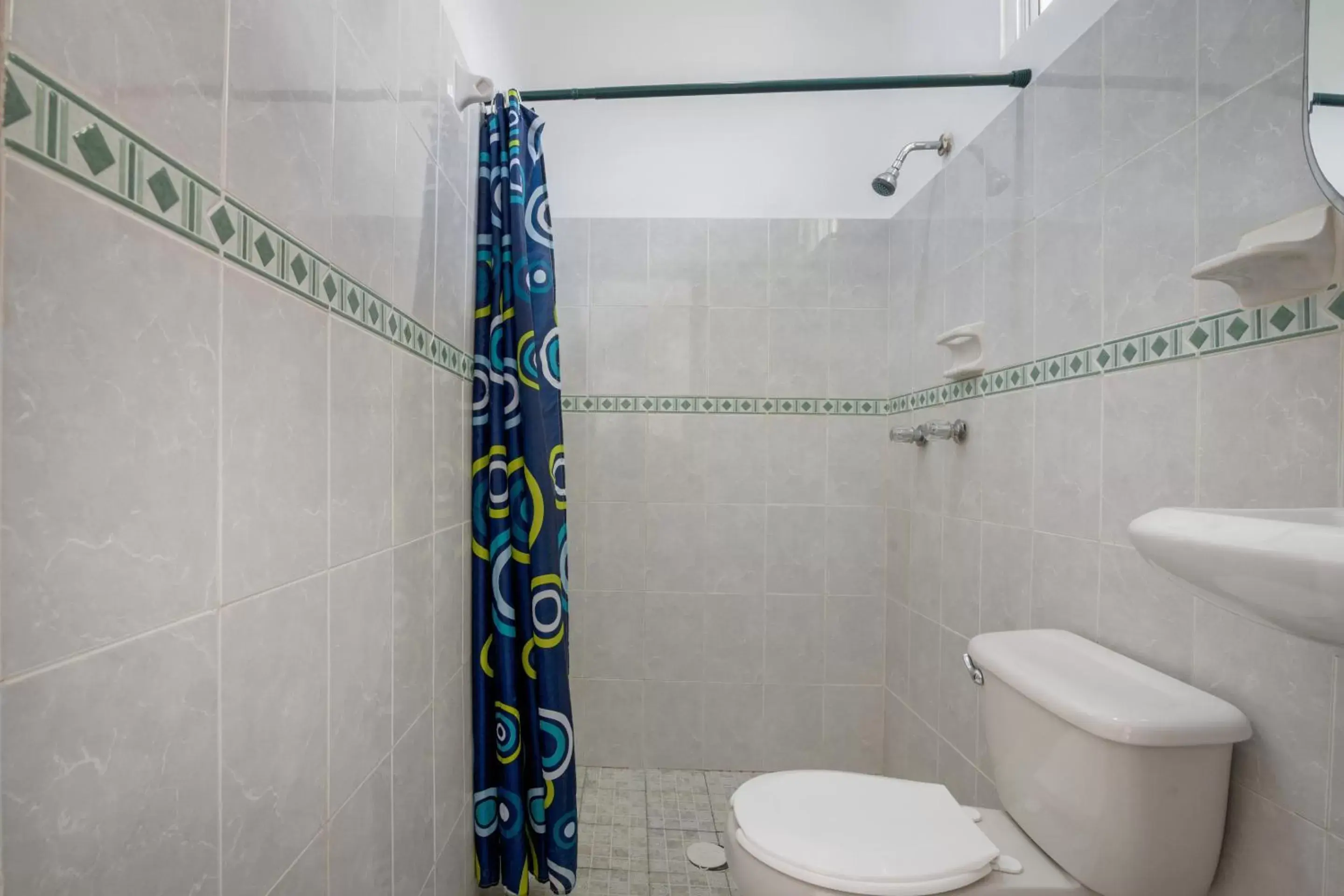 Bathroom in OYO Hotel Palma Real