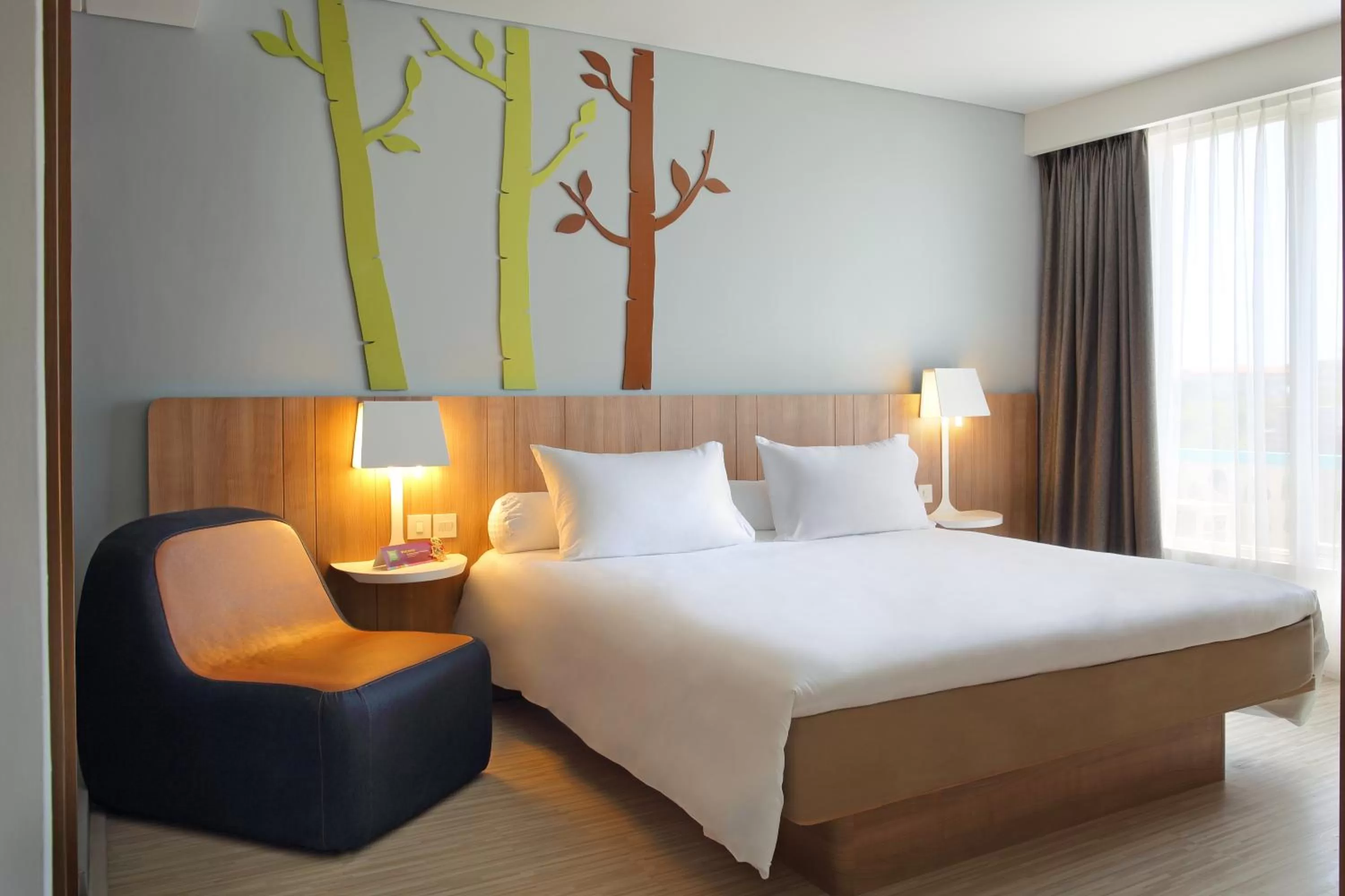 Photo of the whole room, Bed in Grand Livio Kuta Hotel