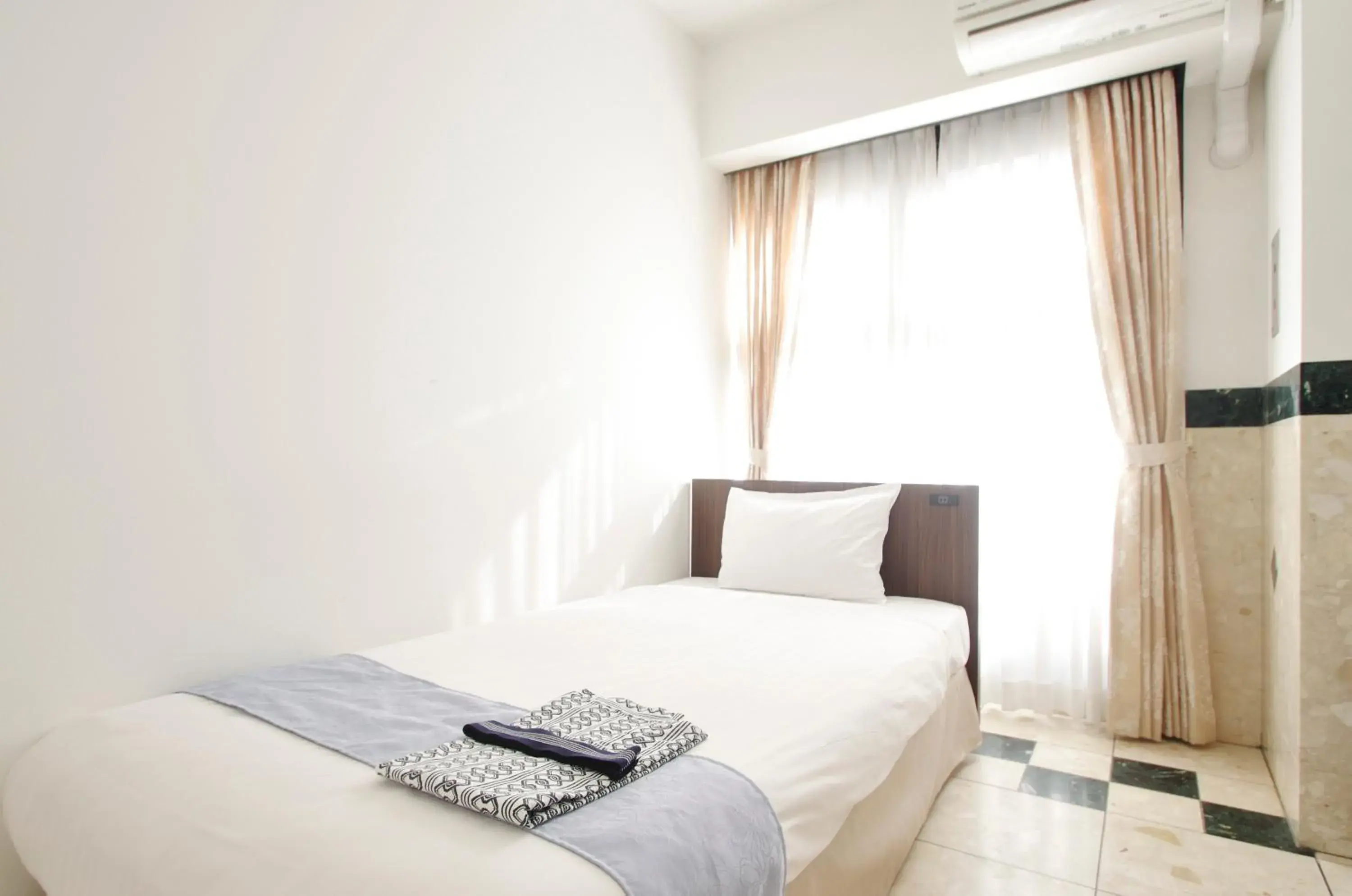 Bed in Hotel Imalle Yokohama Isezakicho Bed in Hotel Imalle Yokohama Isezakicho