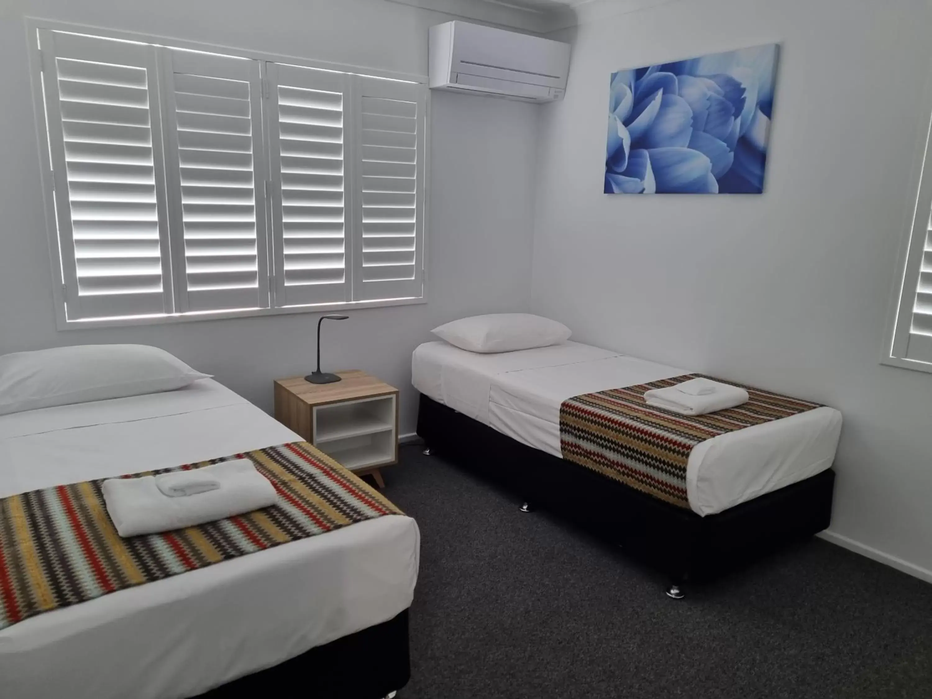 Bedroom, Bed in Rockhampton Serviced Apartments