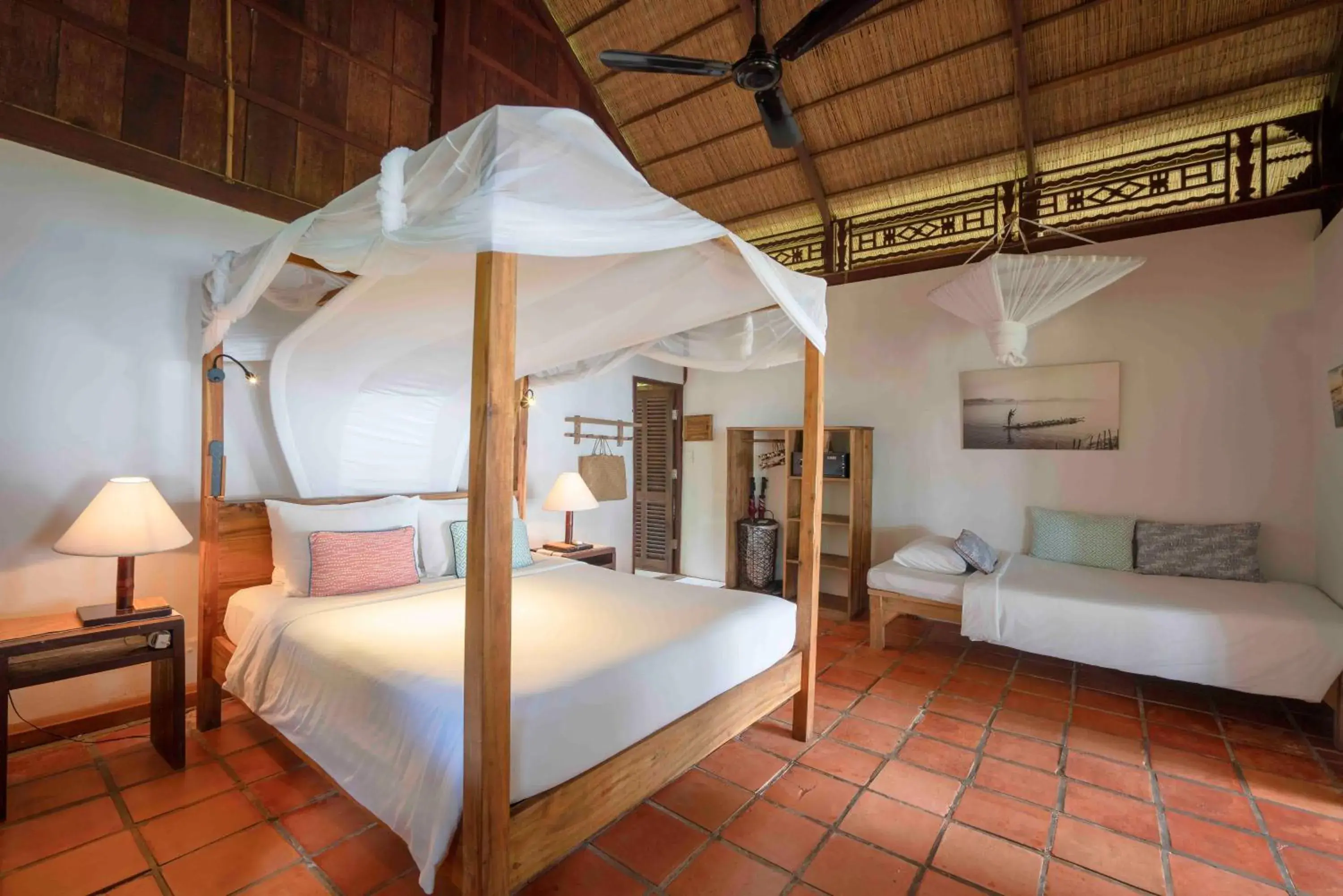 Bed in Mango Bay Resort Bed in Mango Bay Resort