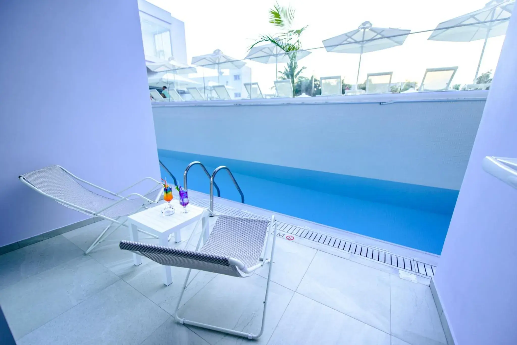 Balcony/Terrace, Swimming Pool in Eleana Hotel