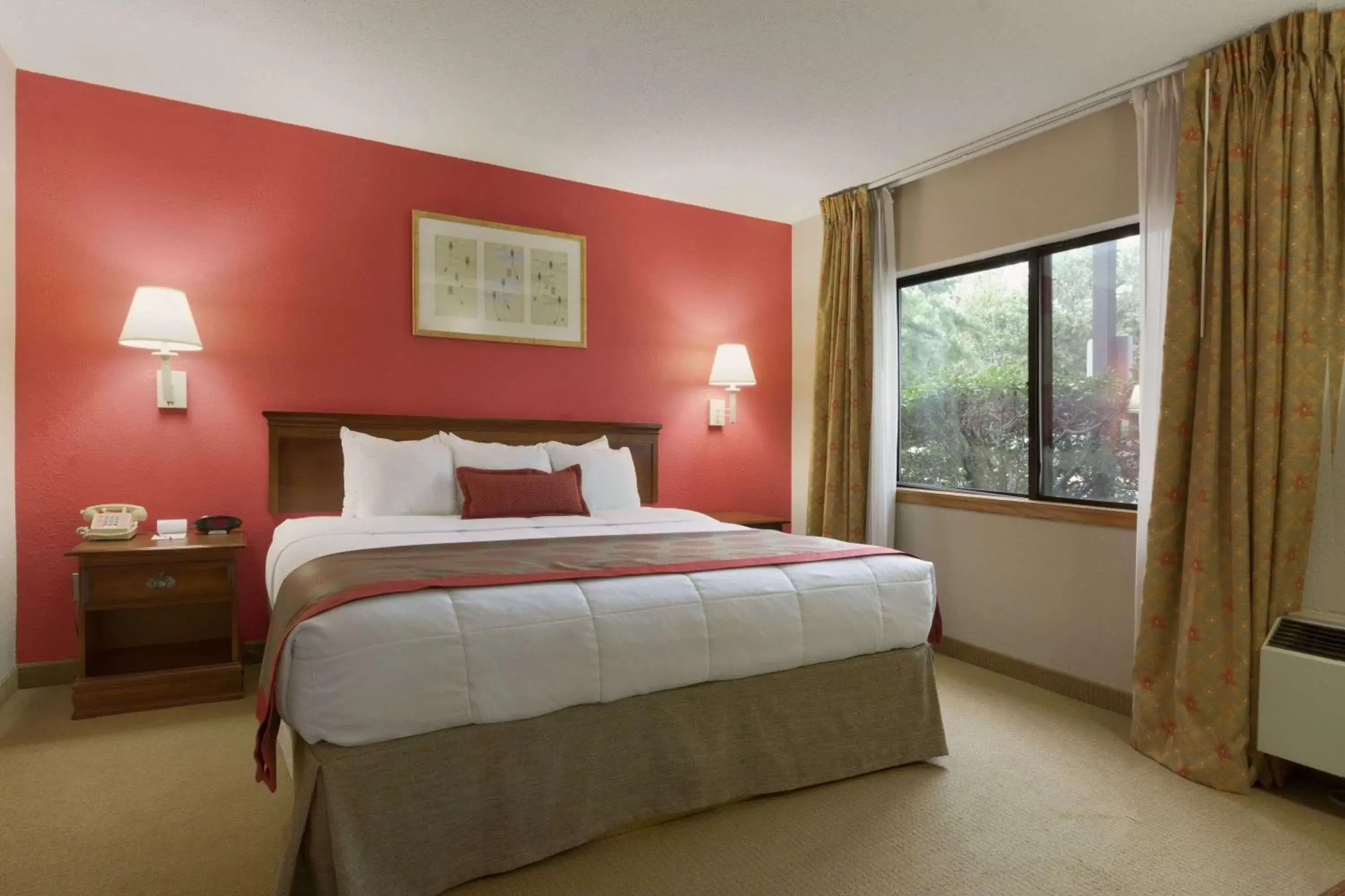 Photo of the whole room, Bed in Ramada by Wyndham Raleigh