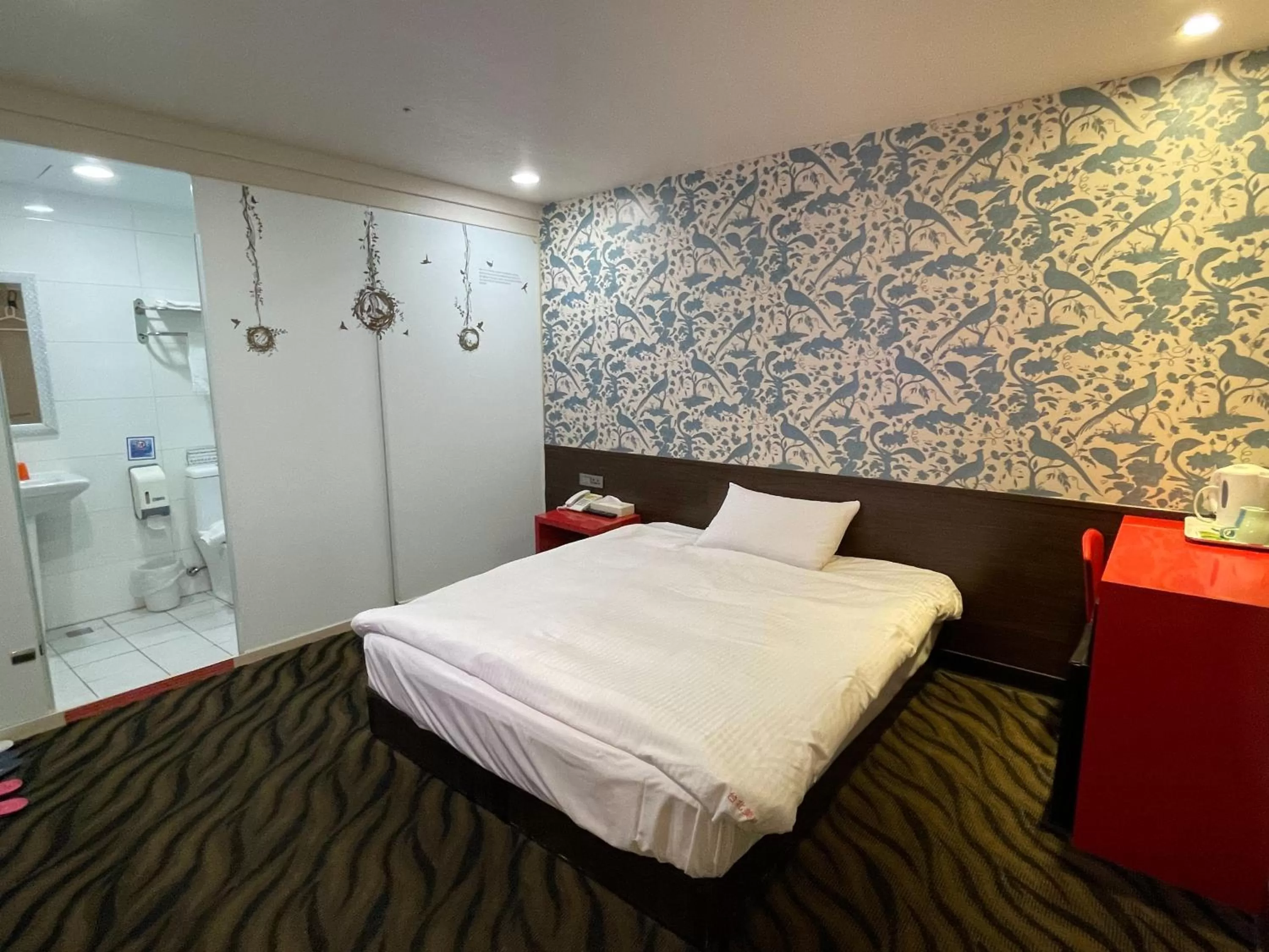 Bed in Funny Ximen Hotel