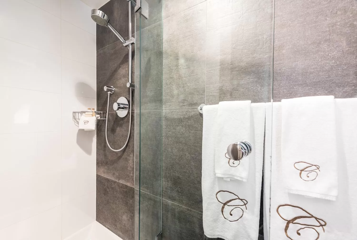 Bathroom in Carmana Hotel & Suites