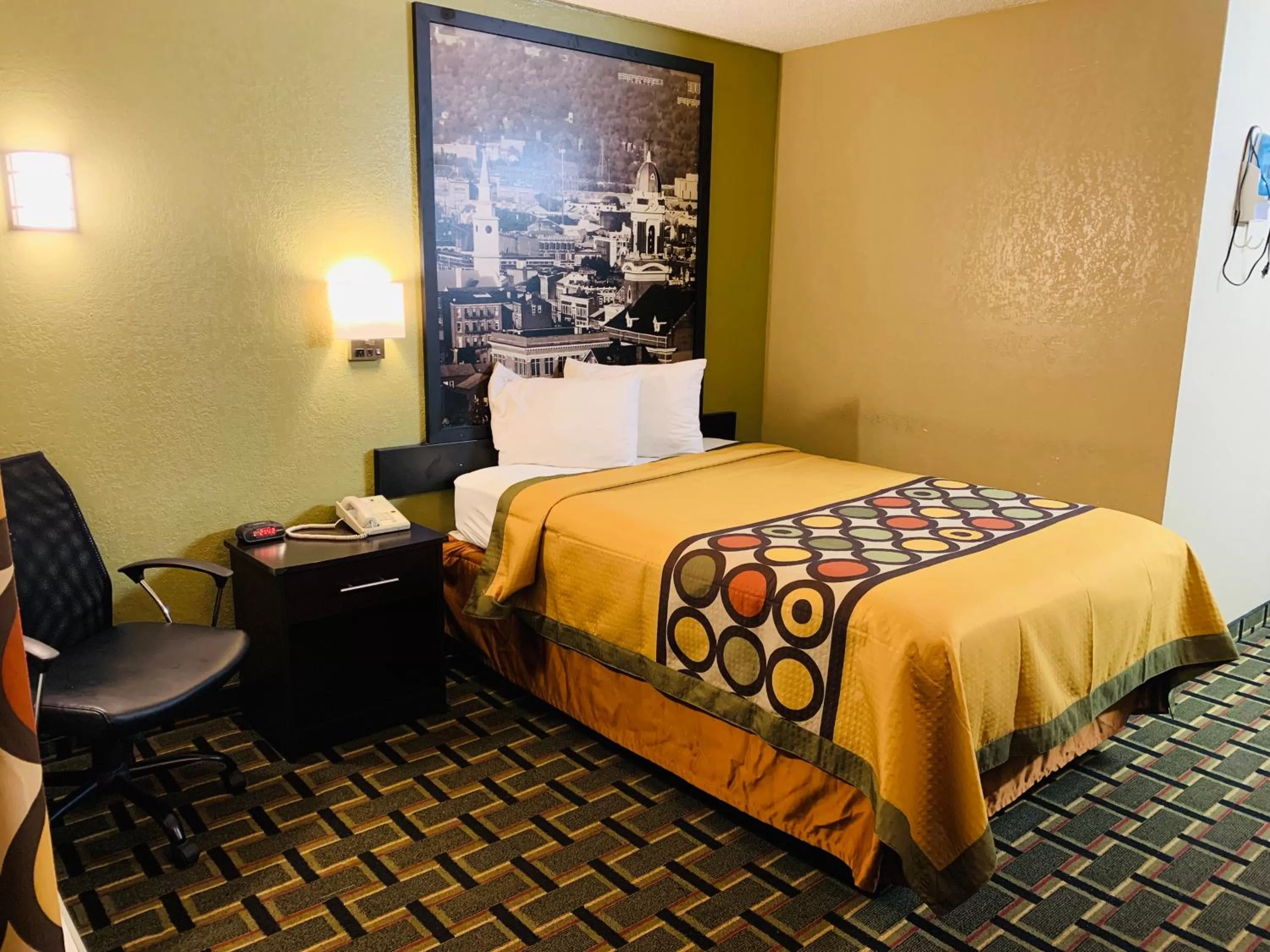 Bed in Super 8 by Wyndham Cincinnati-Springdale OH