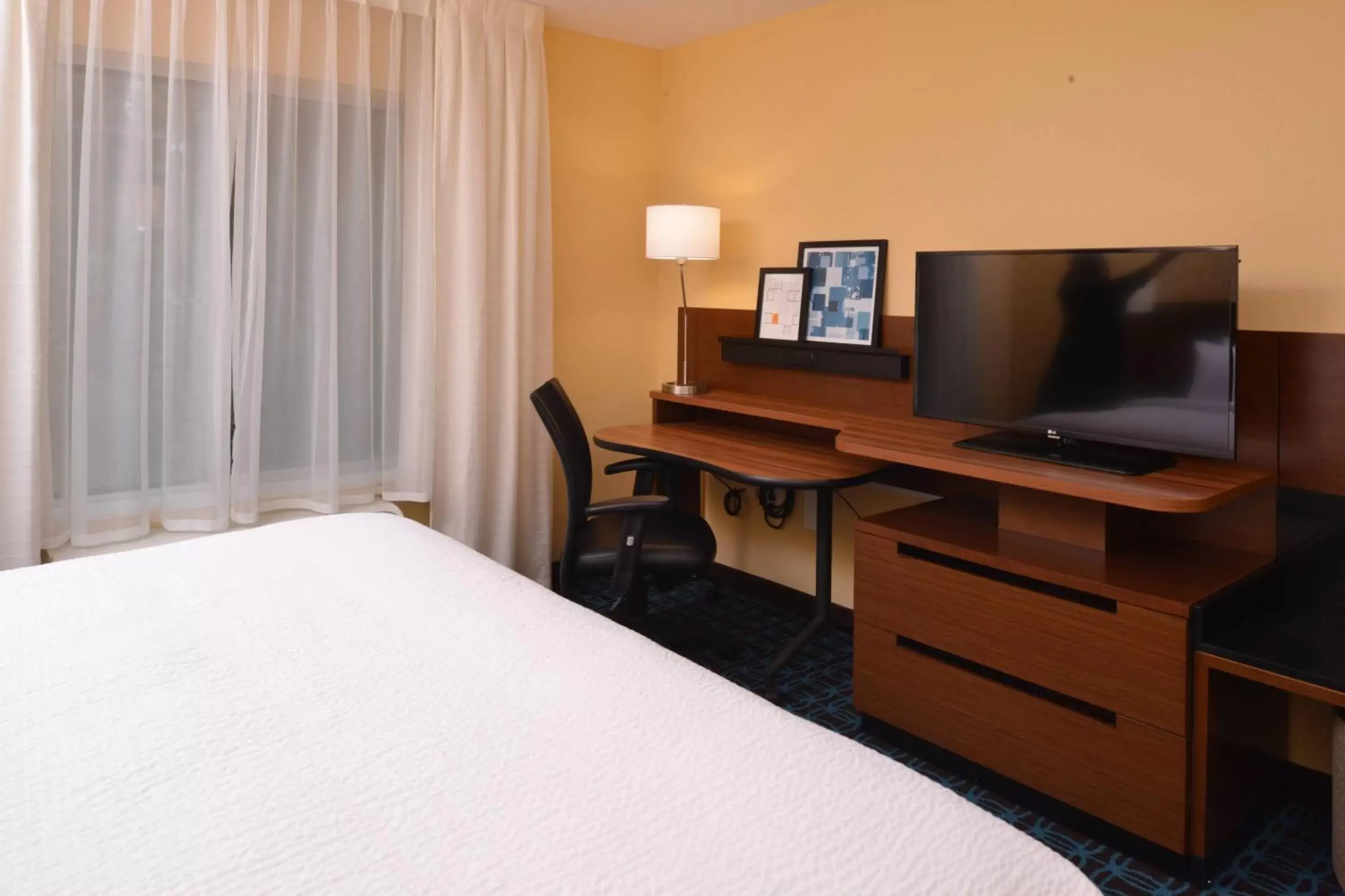 Photo of the whole room, TV/Entertainment Center in Fairfield Inn & Suites by Marriott Fremont