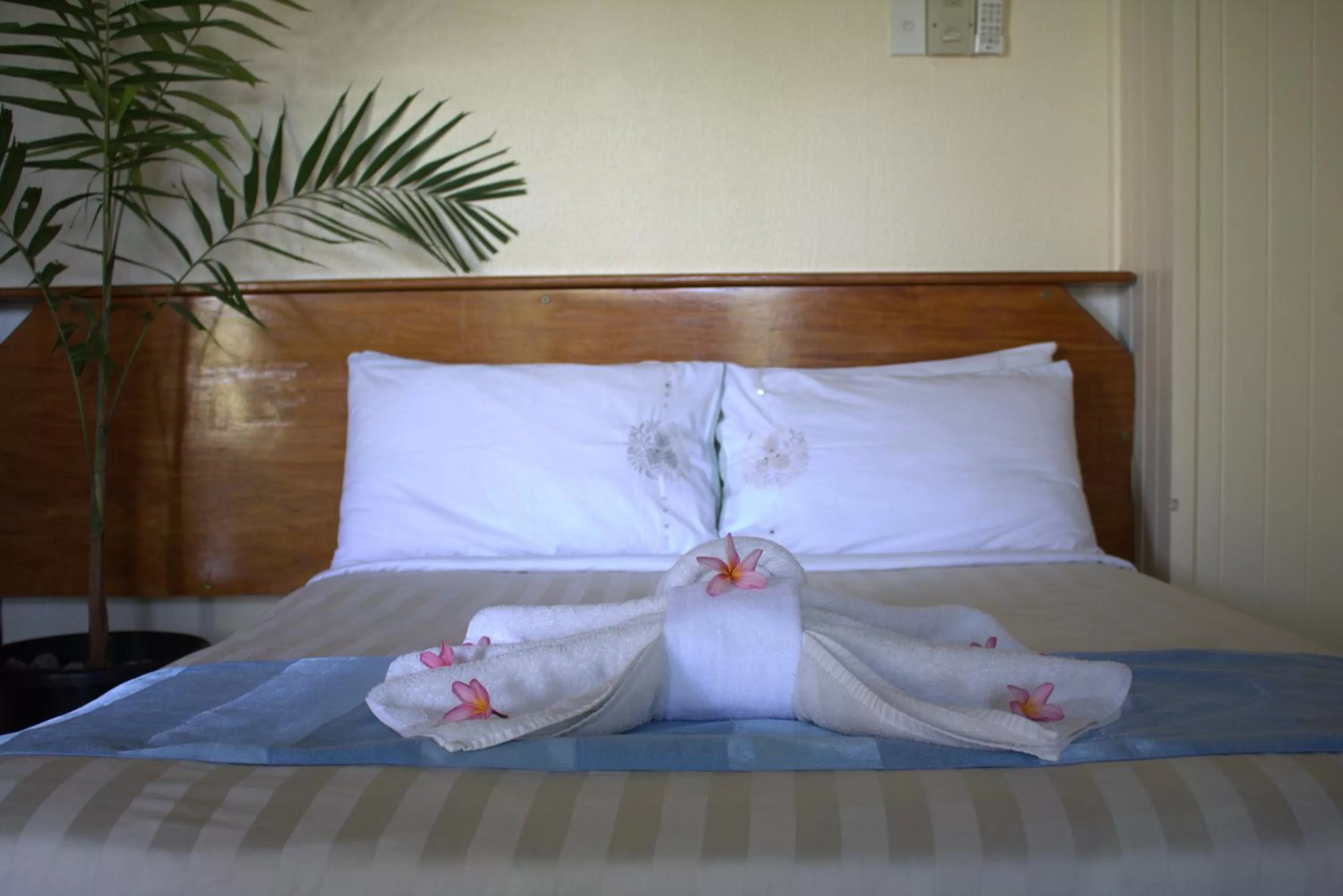 Bed in Rapopo Plantation Resort