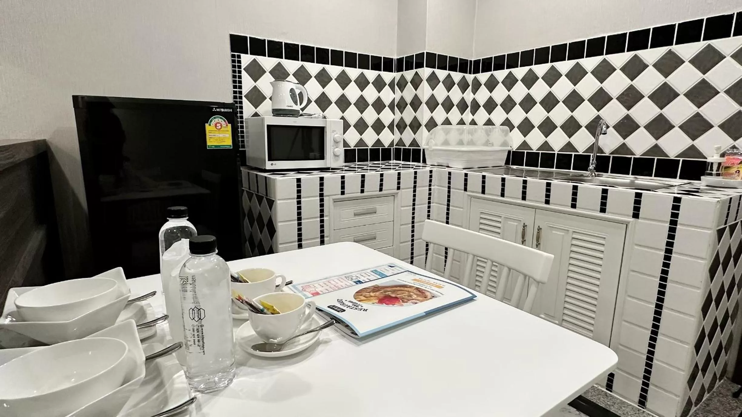 Kitchen or kitchenette in KTK Pattaya Hotel & Residence