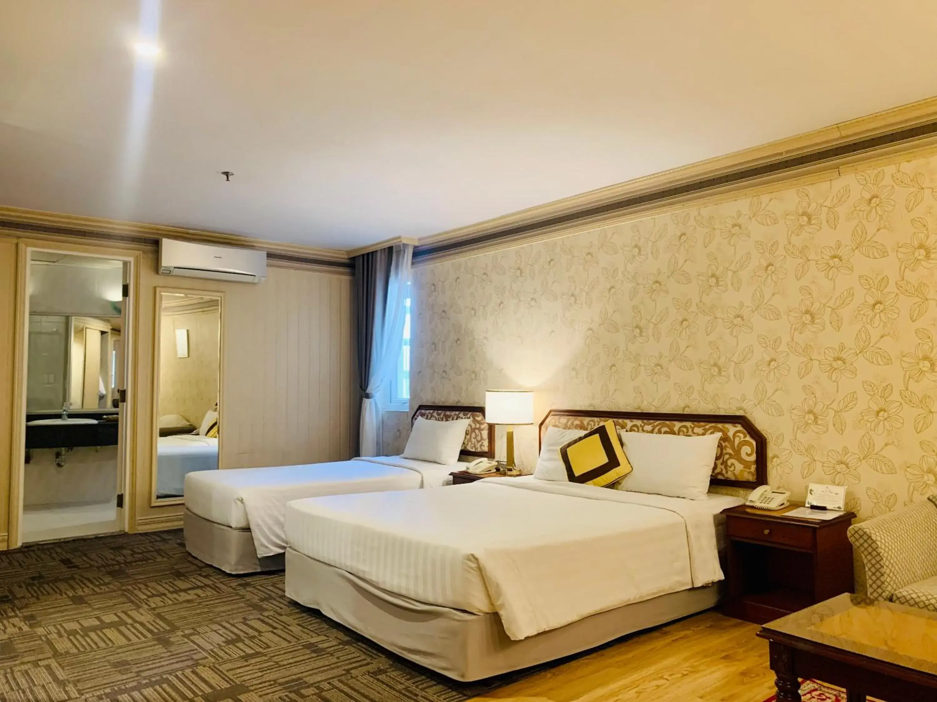 Photo of the whole room, Bed in Lotus Saigon Hotel