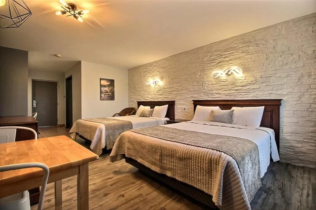 Bed in Hotel Motel Le Quiet