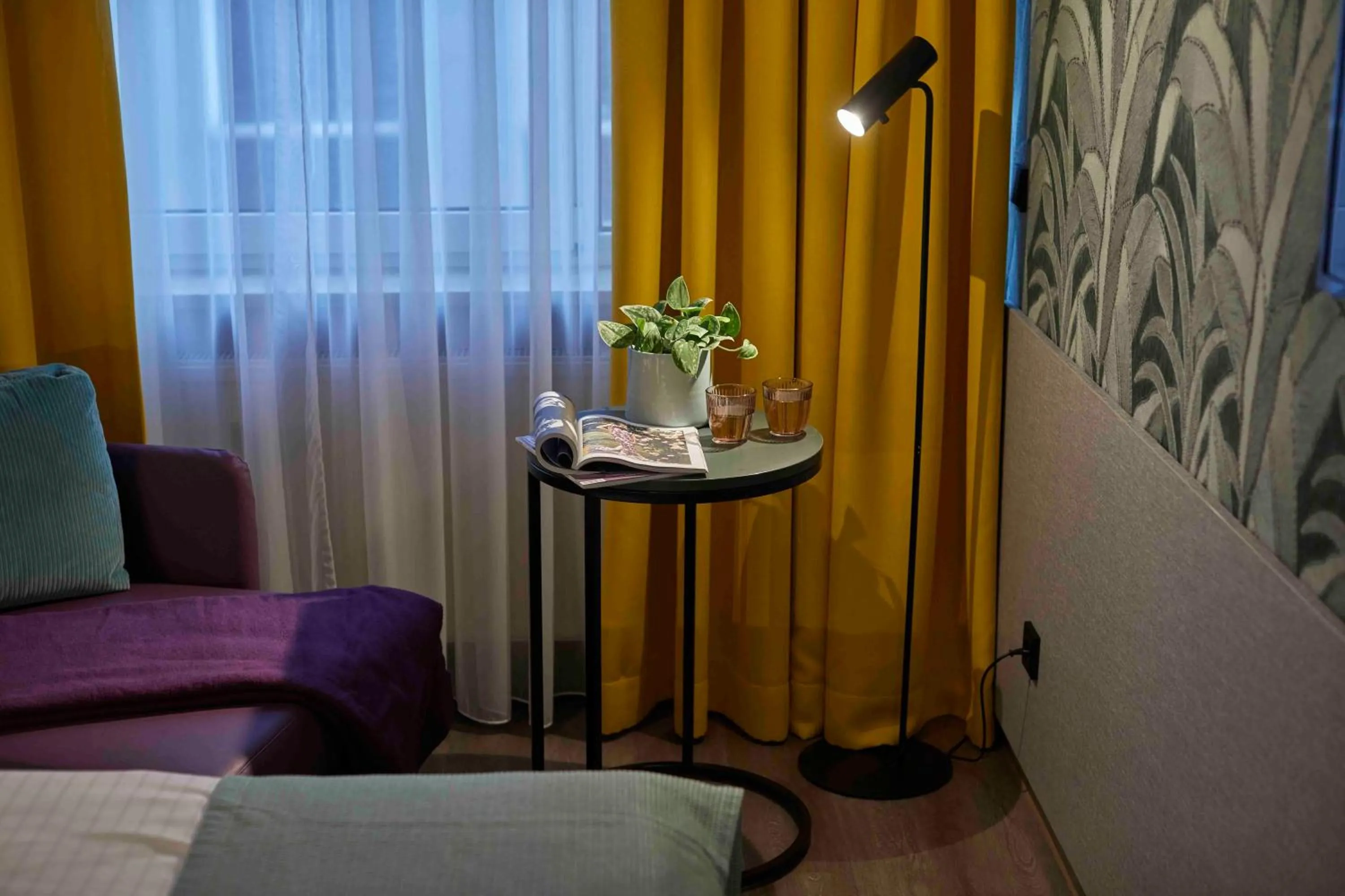 Living room, Bed in Hotel Mirabell by Maier Privathotels