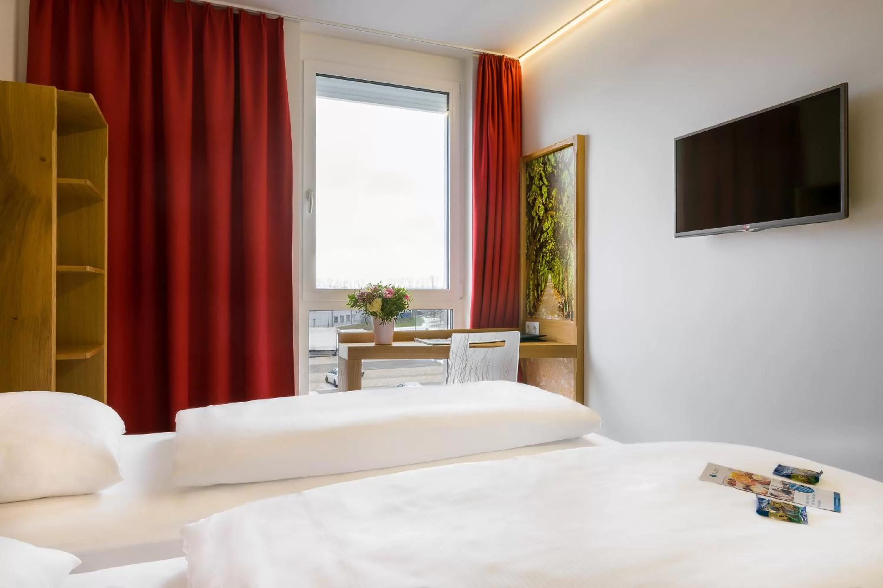 Photo of the whole room, Bed in Atomis Hotel Dachau Munich