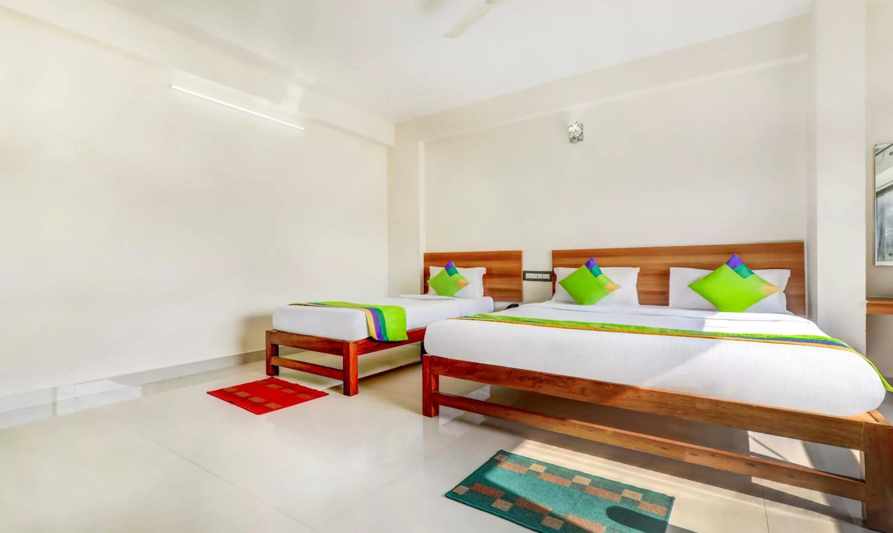 Bedroom, Bed in Treebo Atithi Comforts, 1 Km From Nisargadhama Forest Bedroom, Bed in Treebo Atithi Comforts, 1 Km From Nisargadhama Forest