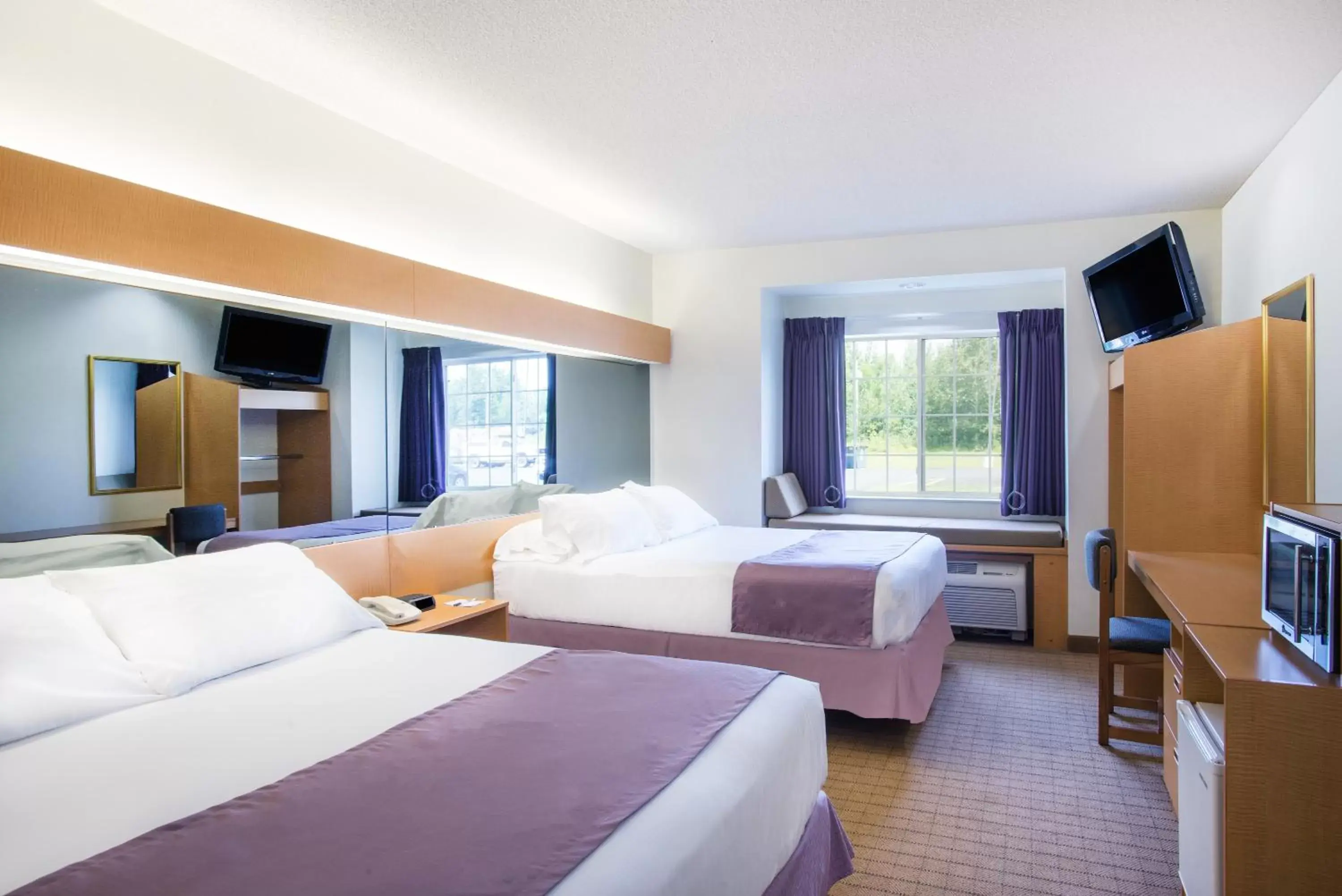 Queen Room with Two Queen Beds and Roll-In Shower - Mobility/Hearing Accessible - Non-Smoking in Microtel Inn & Suites by Wyndham Plattsburgh