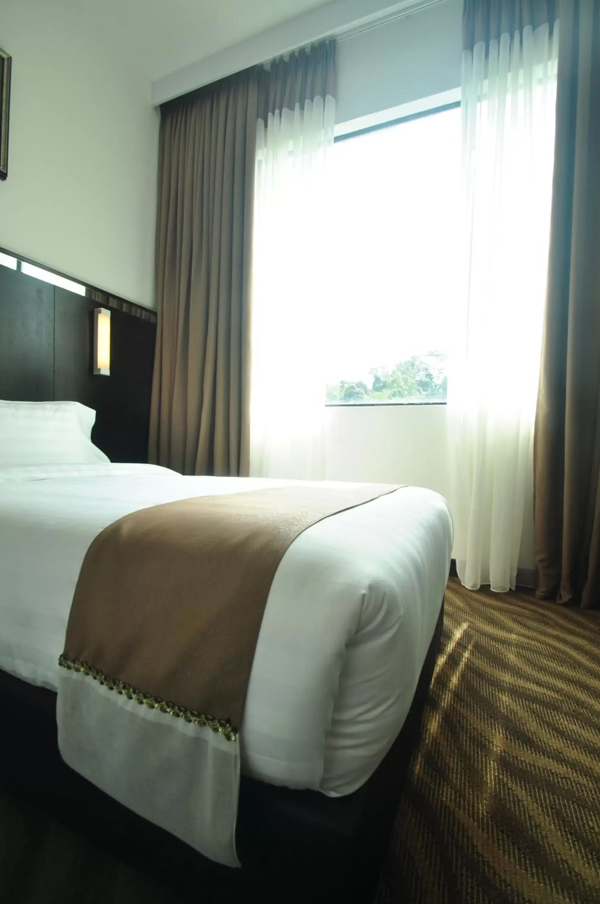 Bed in Dreamtel Kota Kinabalu