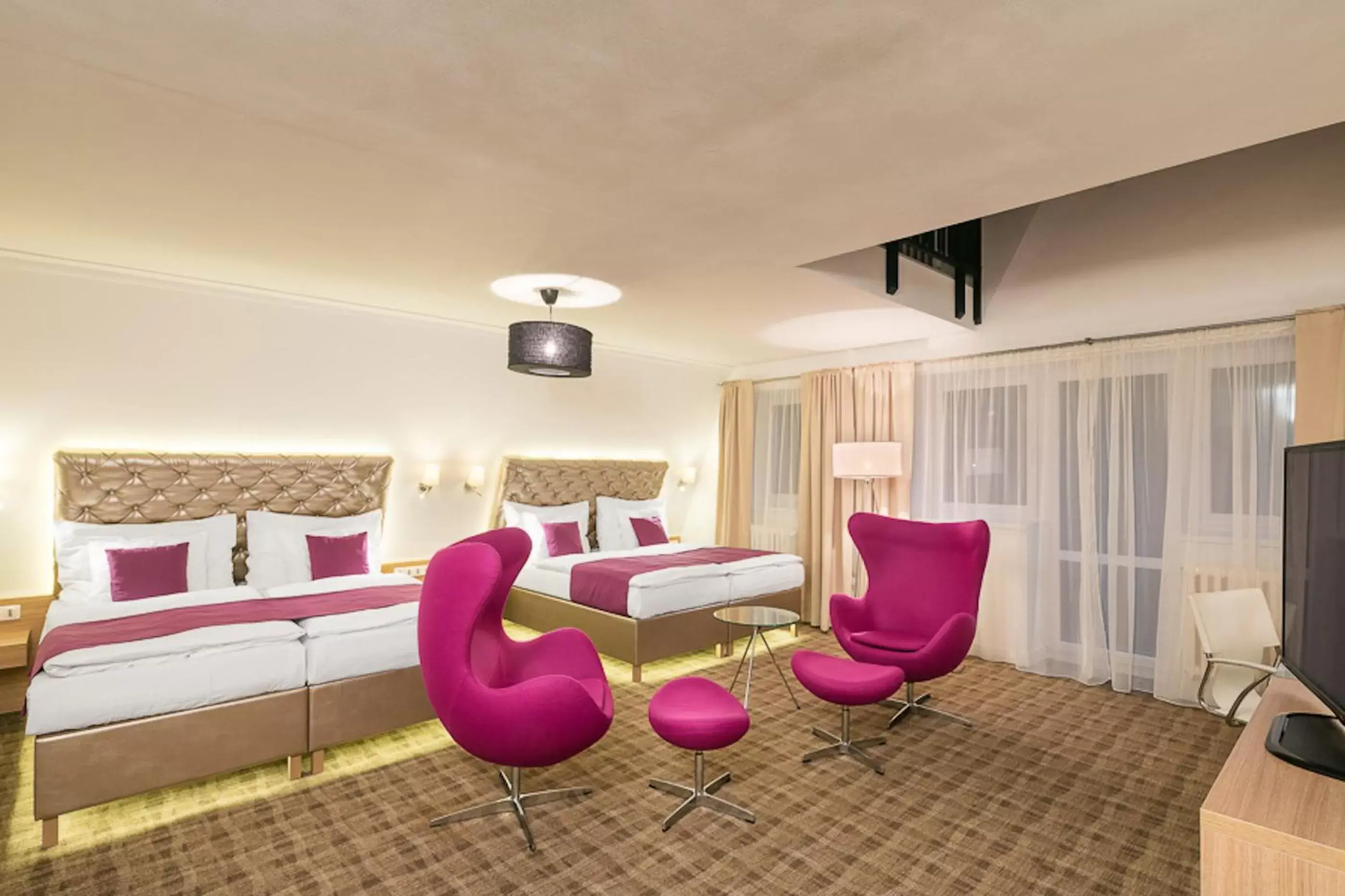 Deluxe Quadruple Room with Balcony in Pytloun Wellness Hotel Harrachov Deluxe Quadruple Room with Balcony in Pytloun Wellness Hotel Harrachov