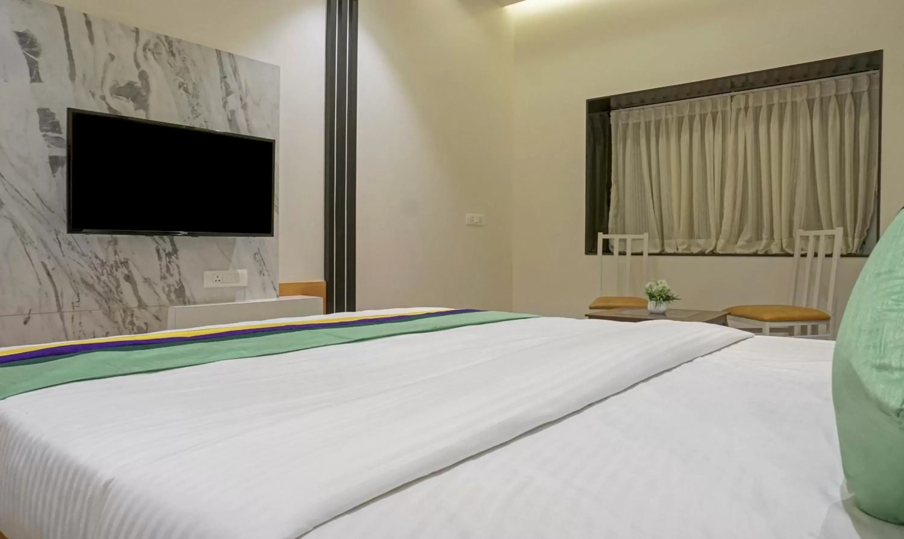 Bedroom, Bed in Treebo The Utsav, Nashik Bedroom, Bed in Treebo The Utsav, Nashik