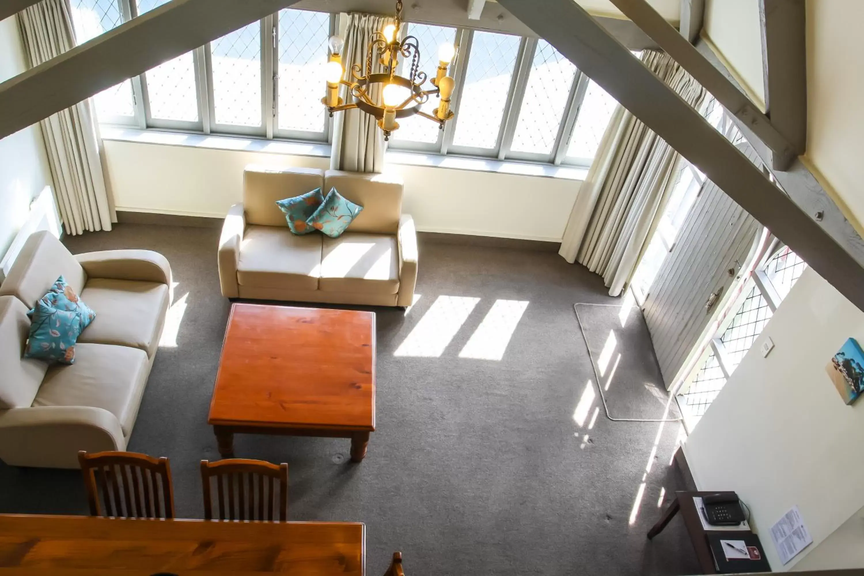 Living room, Seating Area in Camelot Motor Lodge