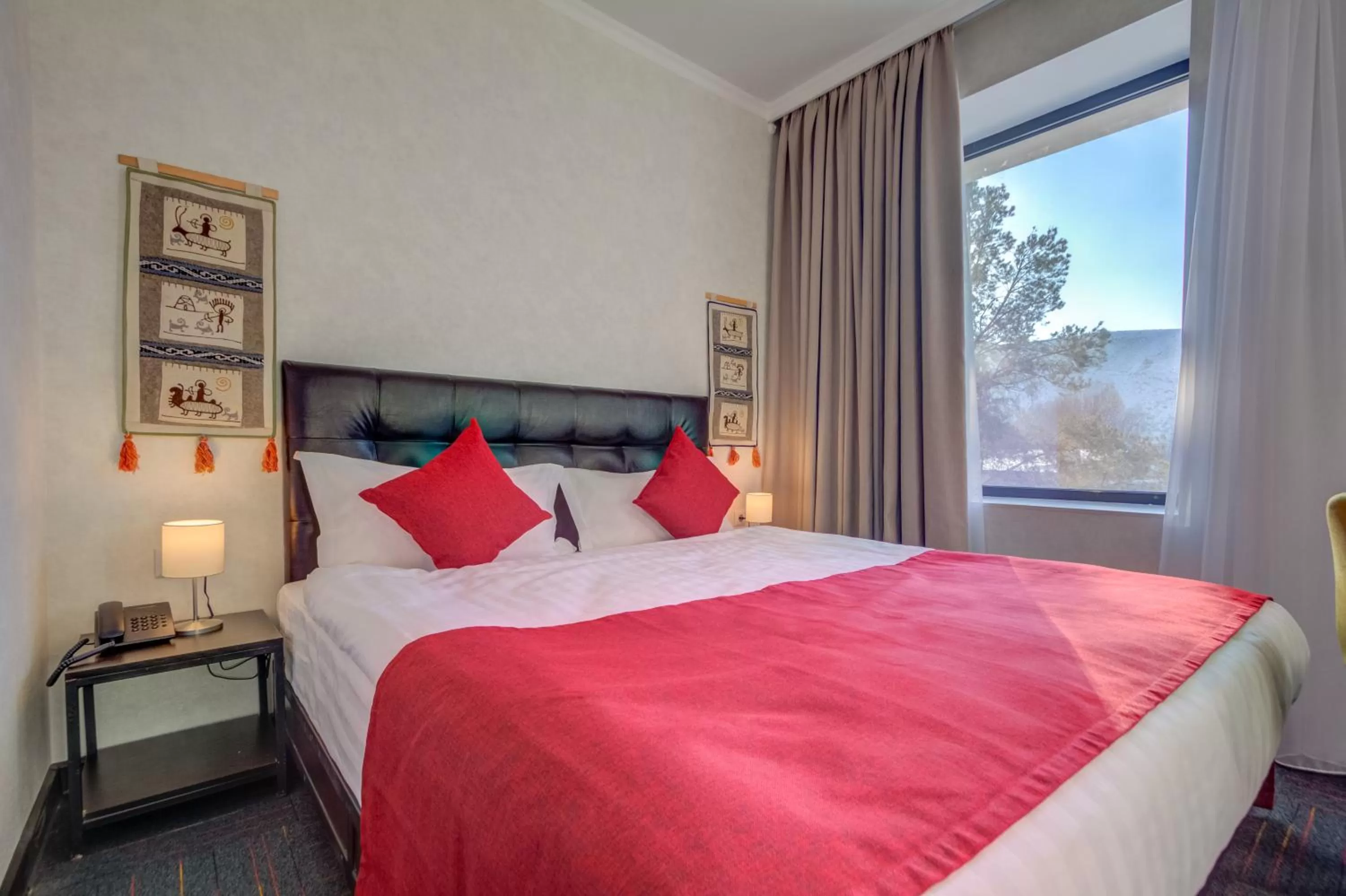 Bed in My hotel Karakol