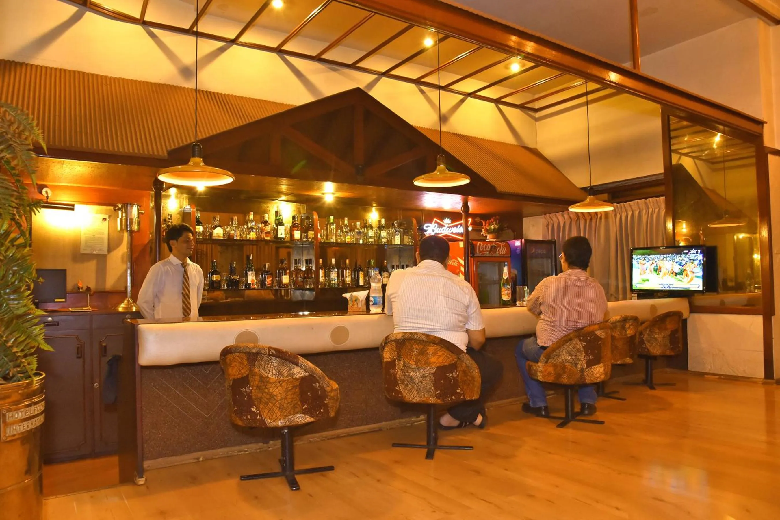 Lounge or bar in Hotel Poonja International