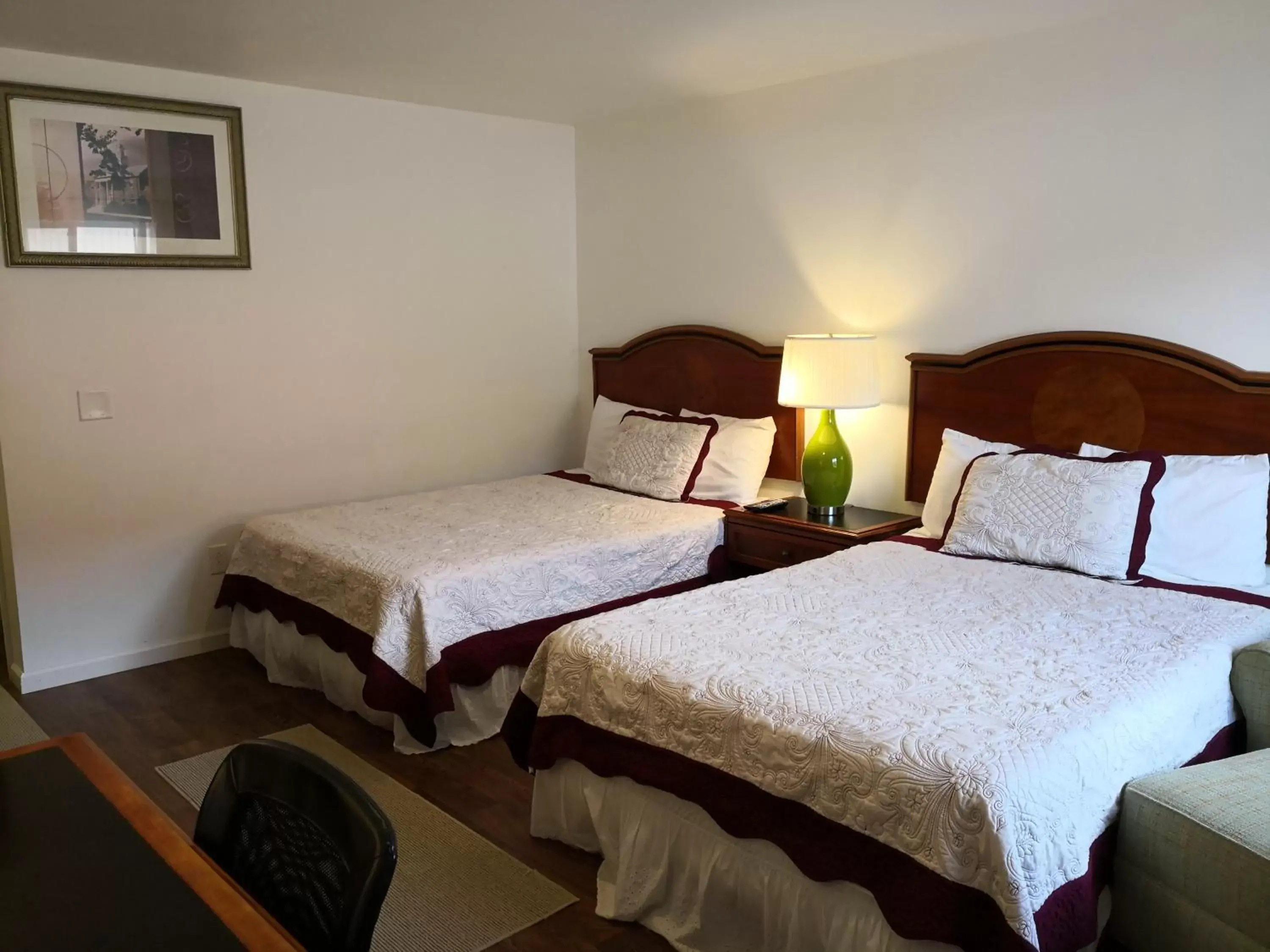 Bed in Apple Inn and Suites Cooperstown Area