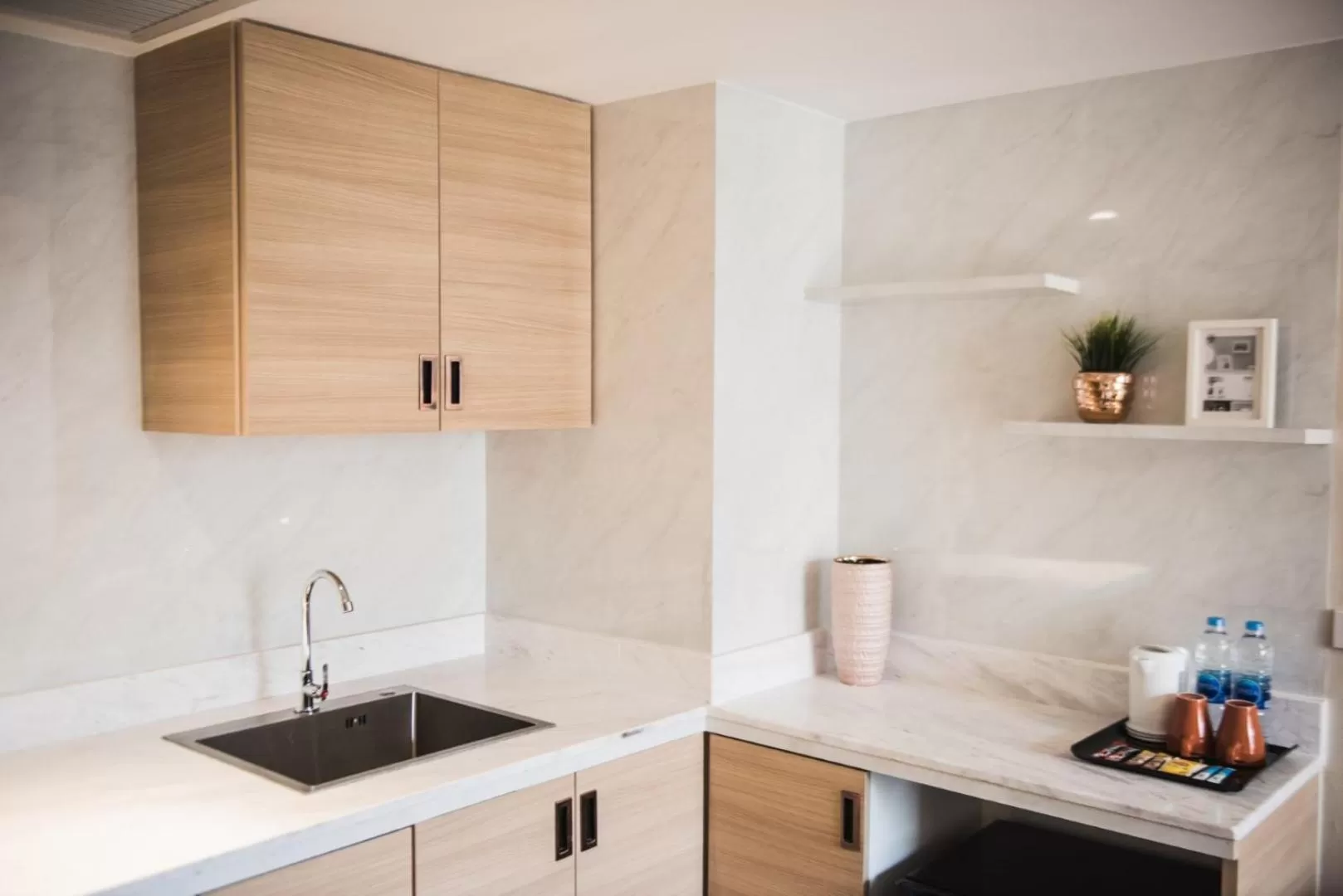 Kitchen or kitchenette in twothree a homely hotel - SHA Extra Plus