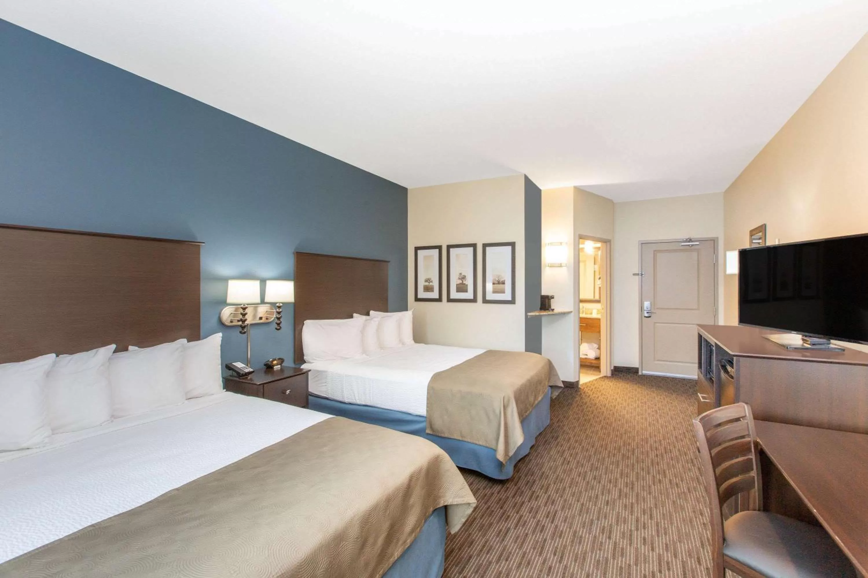 Photo of the whole room, Bed in AmericInn by Wyndham Humboldt