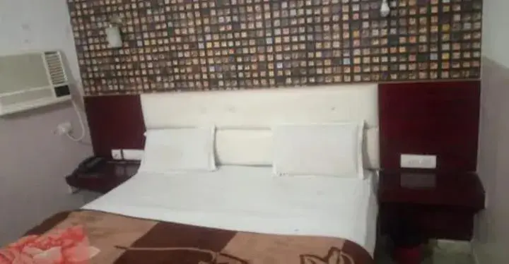 Bed in Hotel Ravi Palace