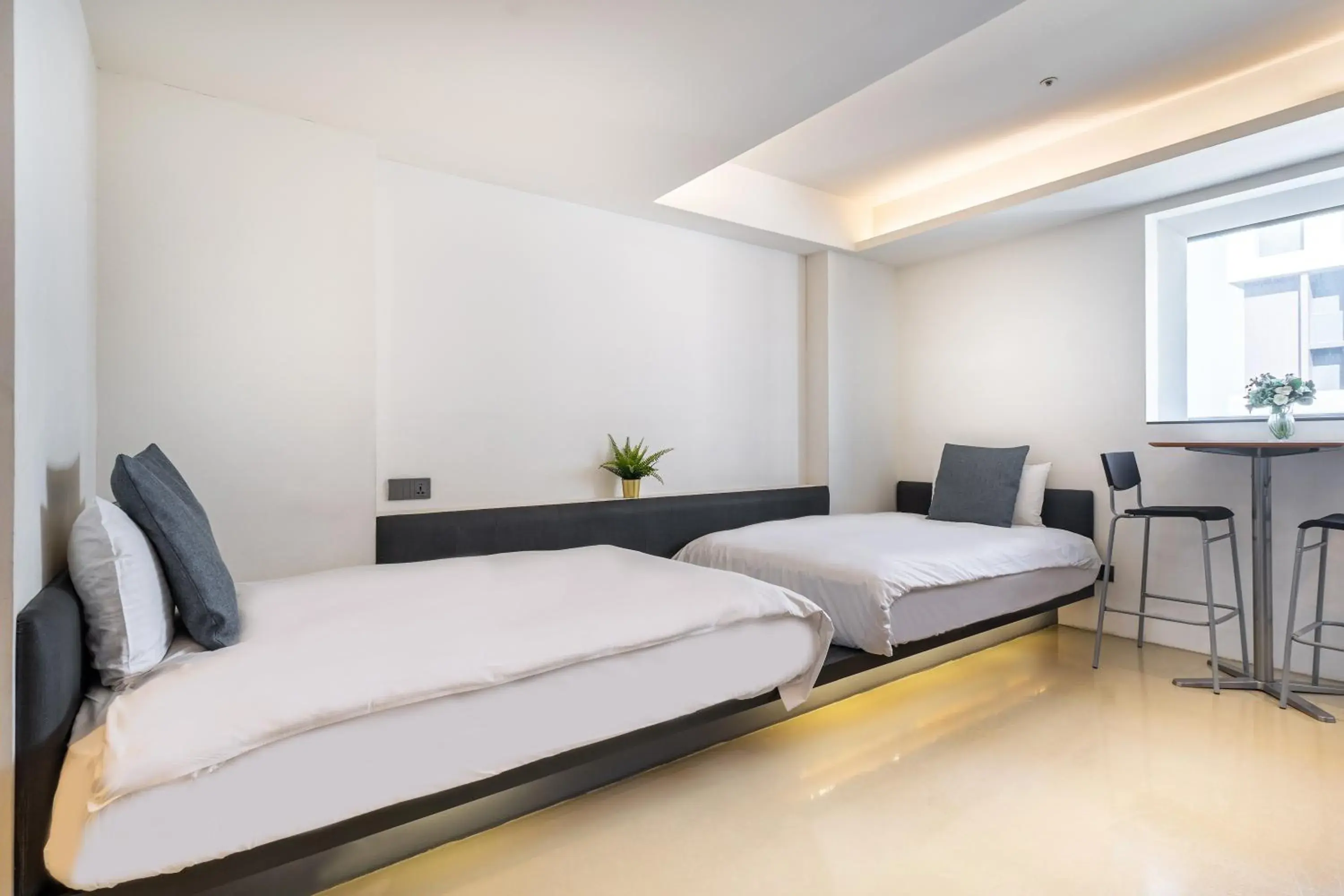 Bed in CHECK inn Taichung LiMing