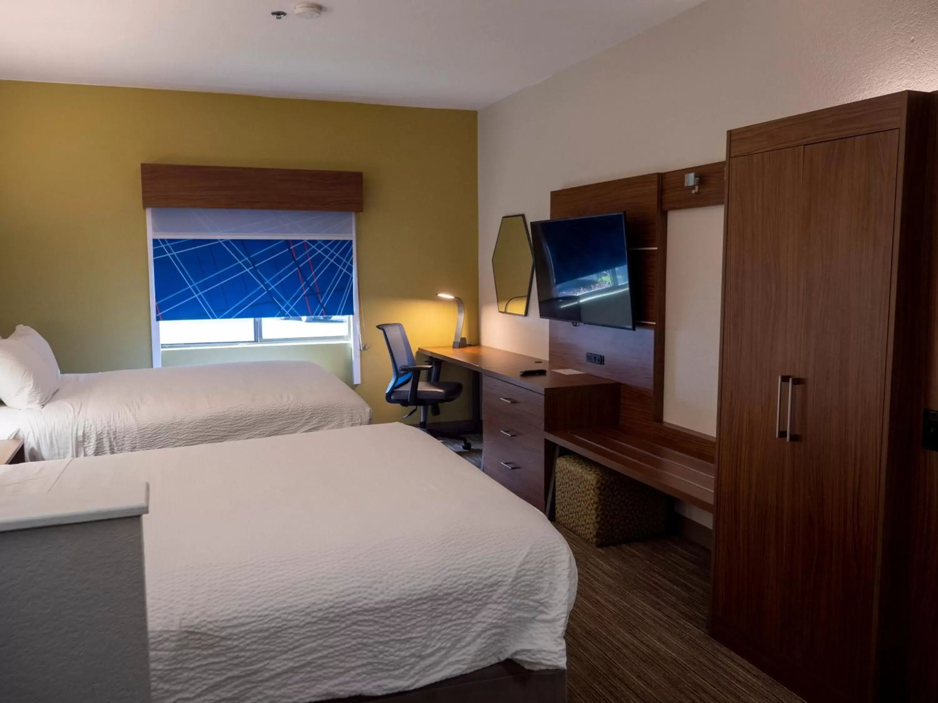 Bed in Holiday Inn Express & Suites Greenville Airport, an IHG Hotel