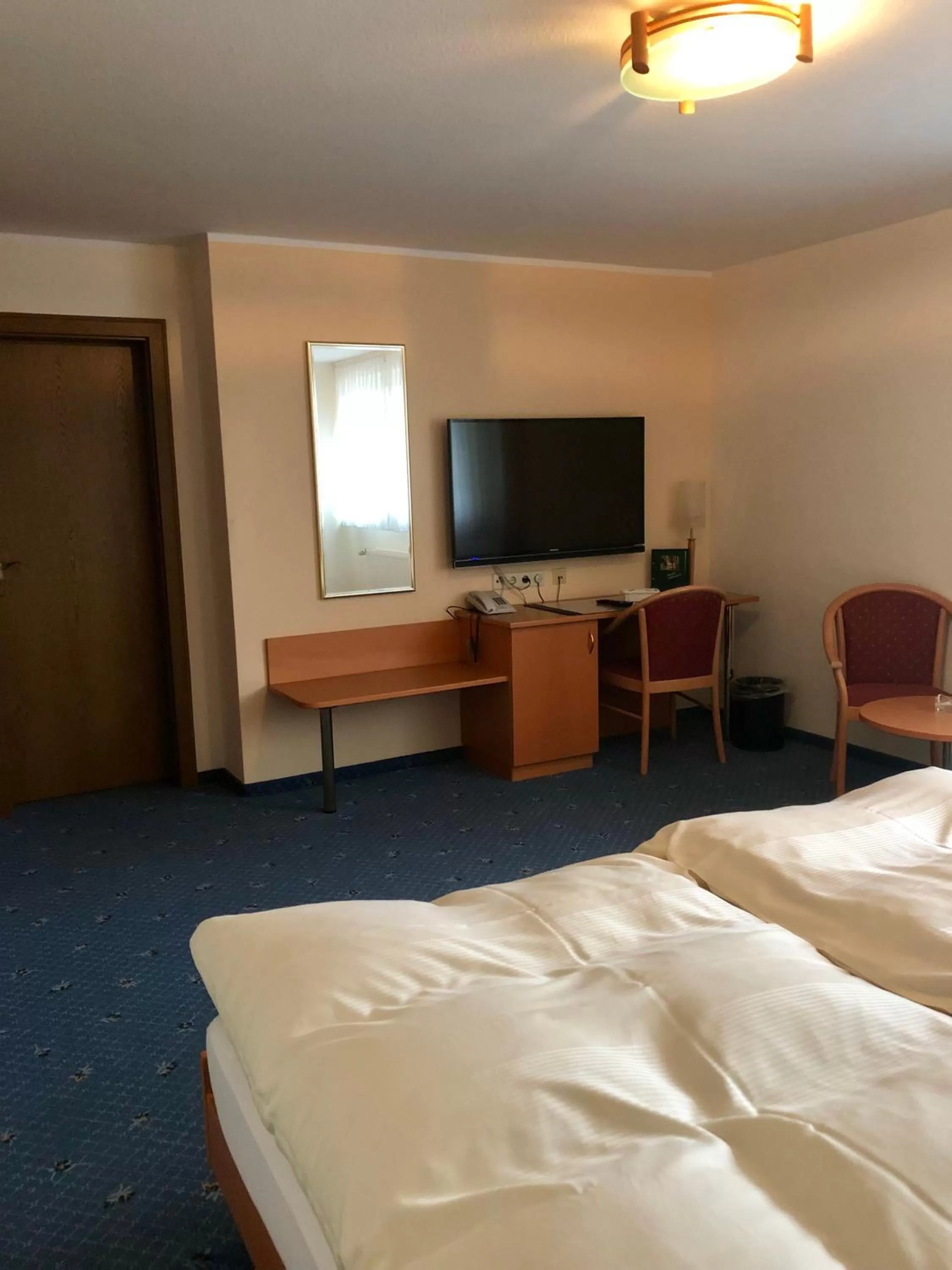 Photo of the whole room, Bed in Gasthof Waldesruh