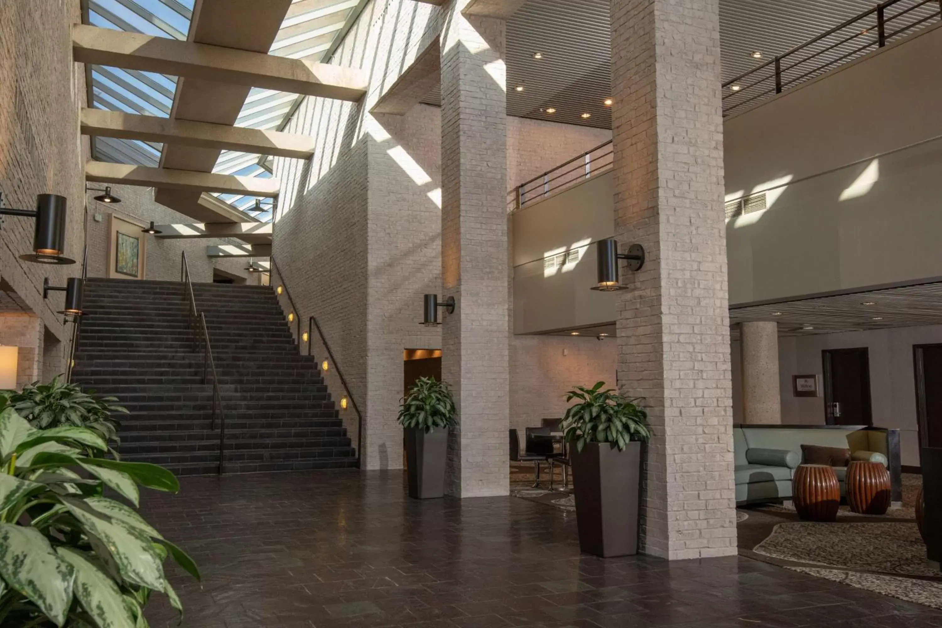 Lobby or reception in The Inverness Denver, a Hilton Golf & Spa Resort