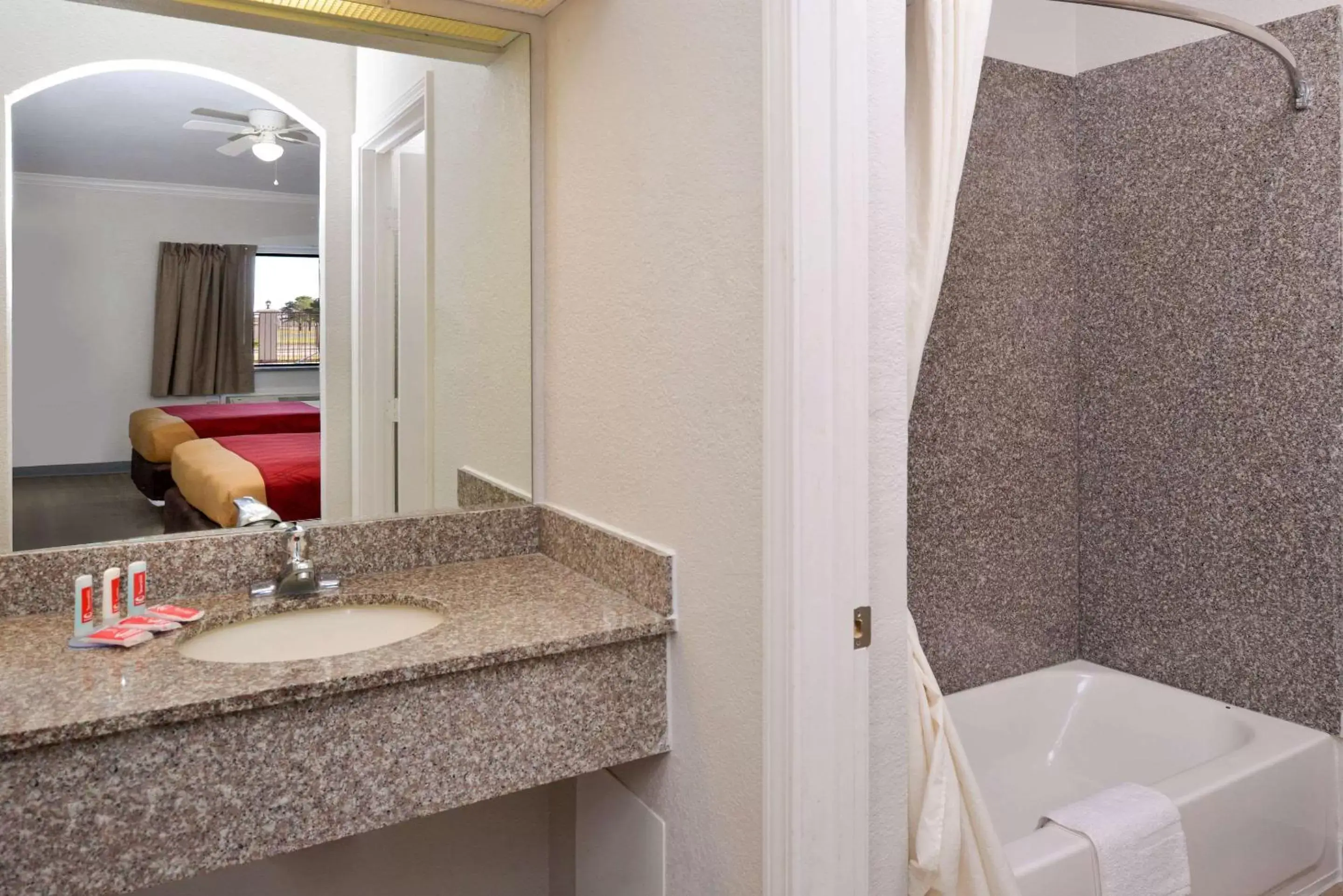 Bathroom in Econo Lodge Inn & Suites Port Arthur near Sabine Pass