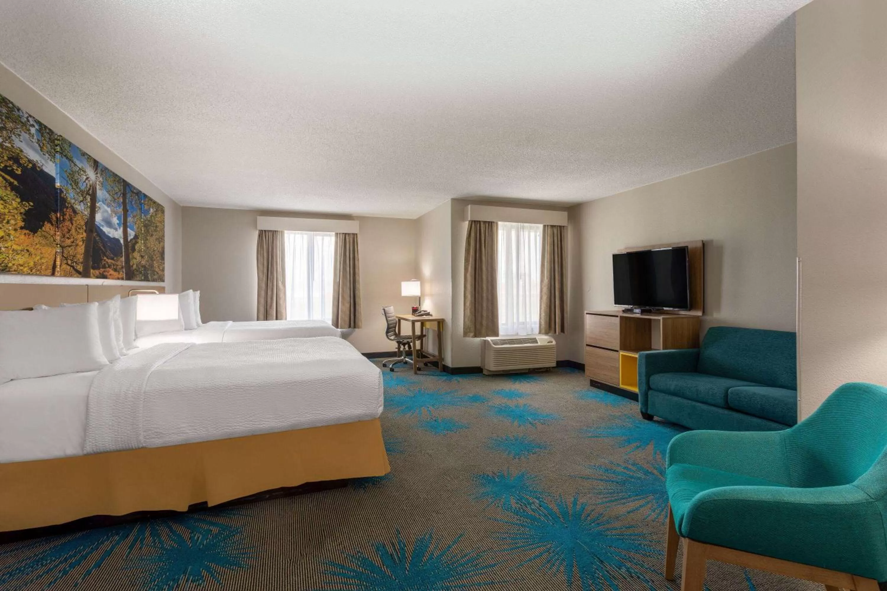 Bed in Days Inn & Suites by Wyndham Denver International Airport