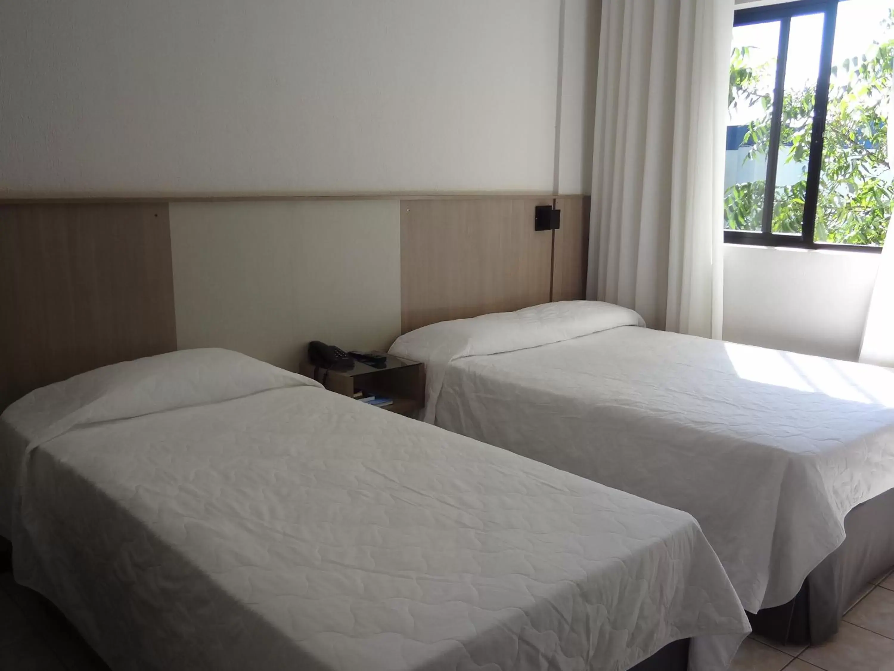 Bed in Iguassu Express Hotel