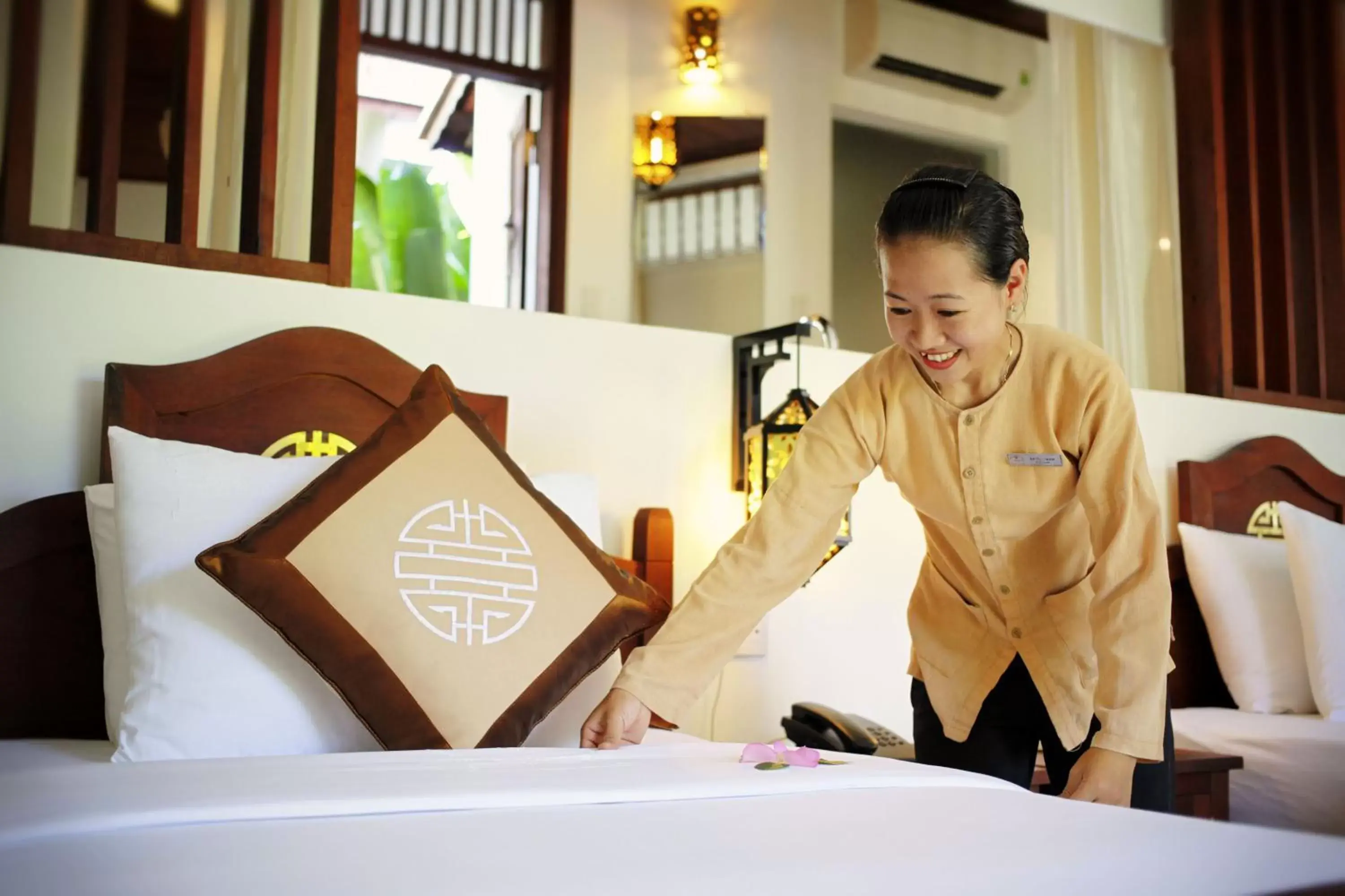 Staff in Legacy Hoi An Resort - formerly Ancient House Village Resort & Spa