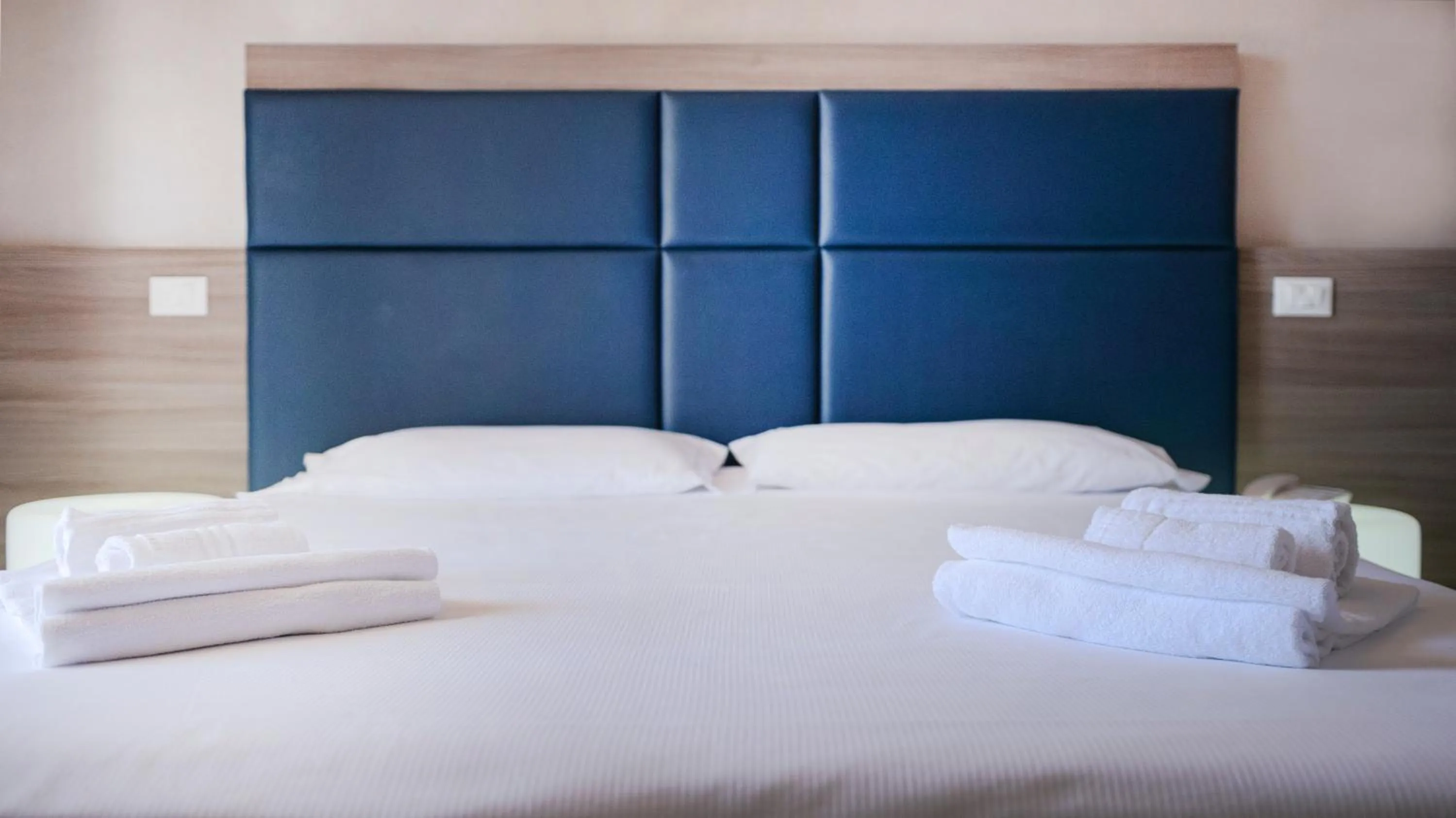 Bed in Hotel Riviera