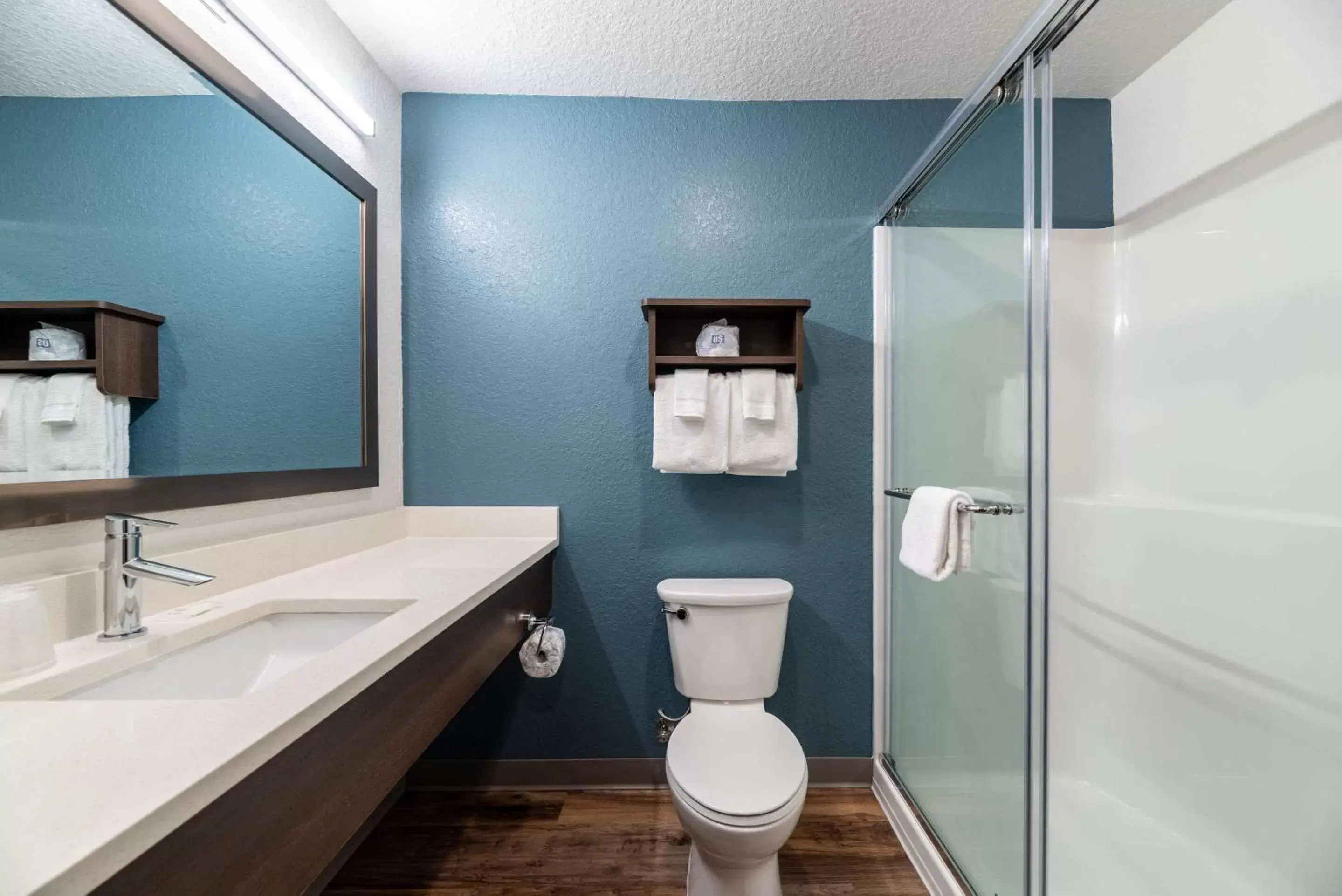 Bathroom in WoodSpring Suites Sanford North I-4 Orlando Area